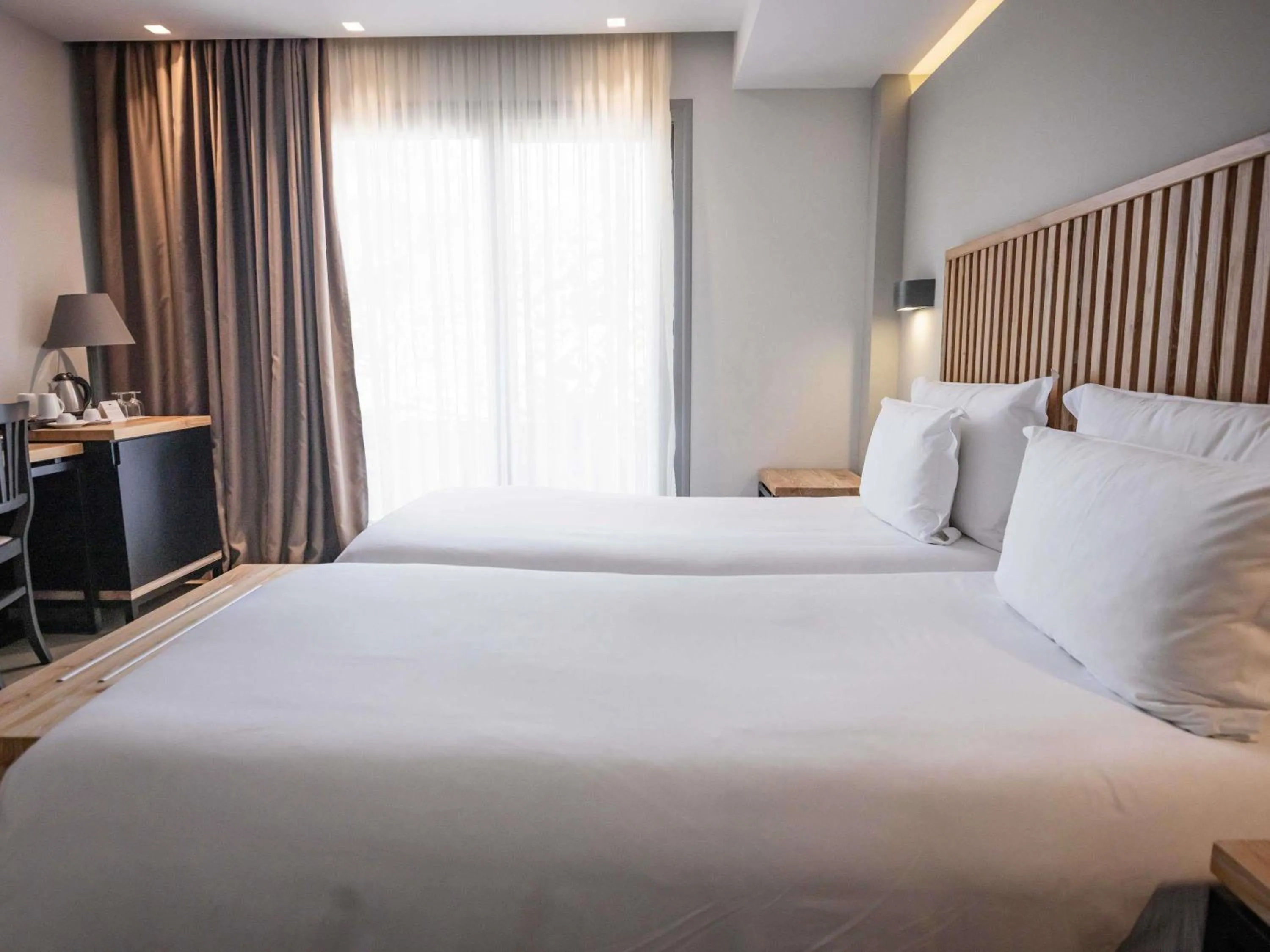 Bedroom, Bed in Movenpick Resort Agios Nikolaos Sivota