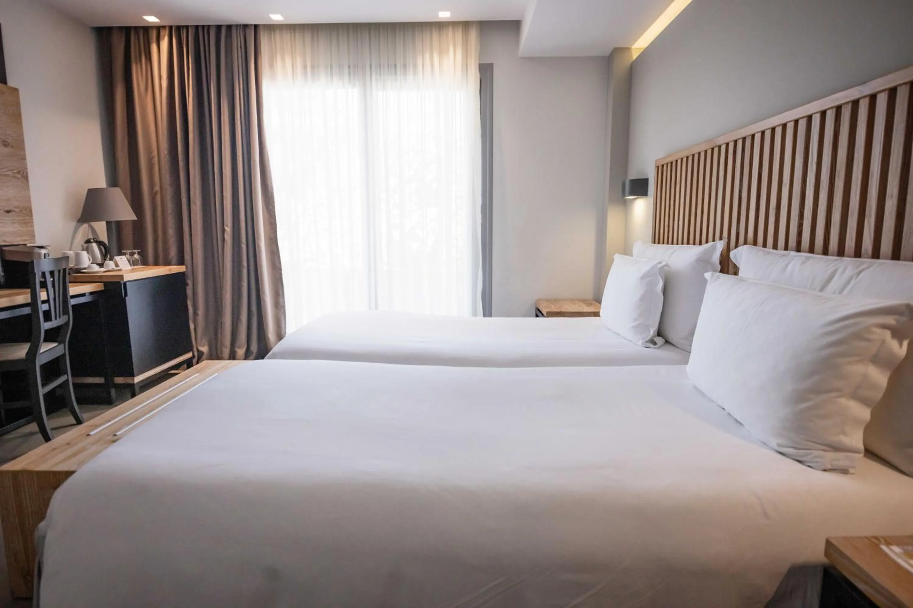 Bed in Movenpick Resort Agios Nikolaos Sivota