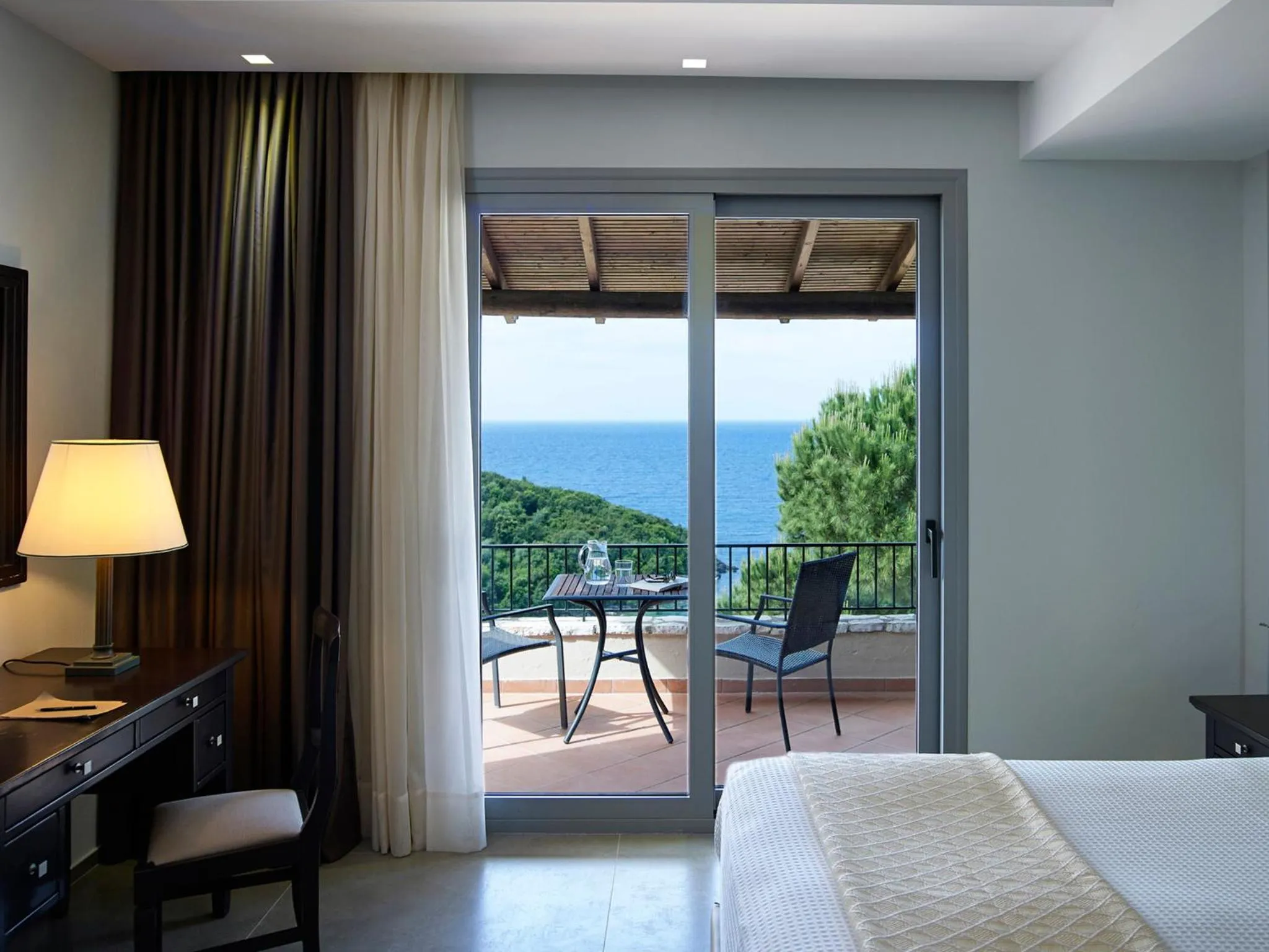 Photo of the whole room, Bed in Movenpick Resort Agios Nikolaos Sivota