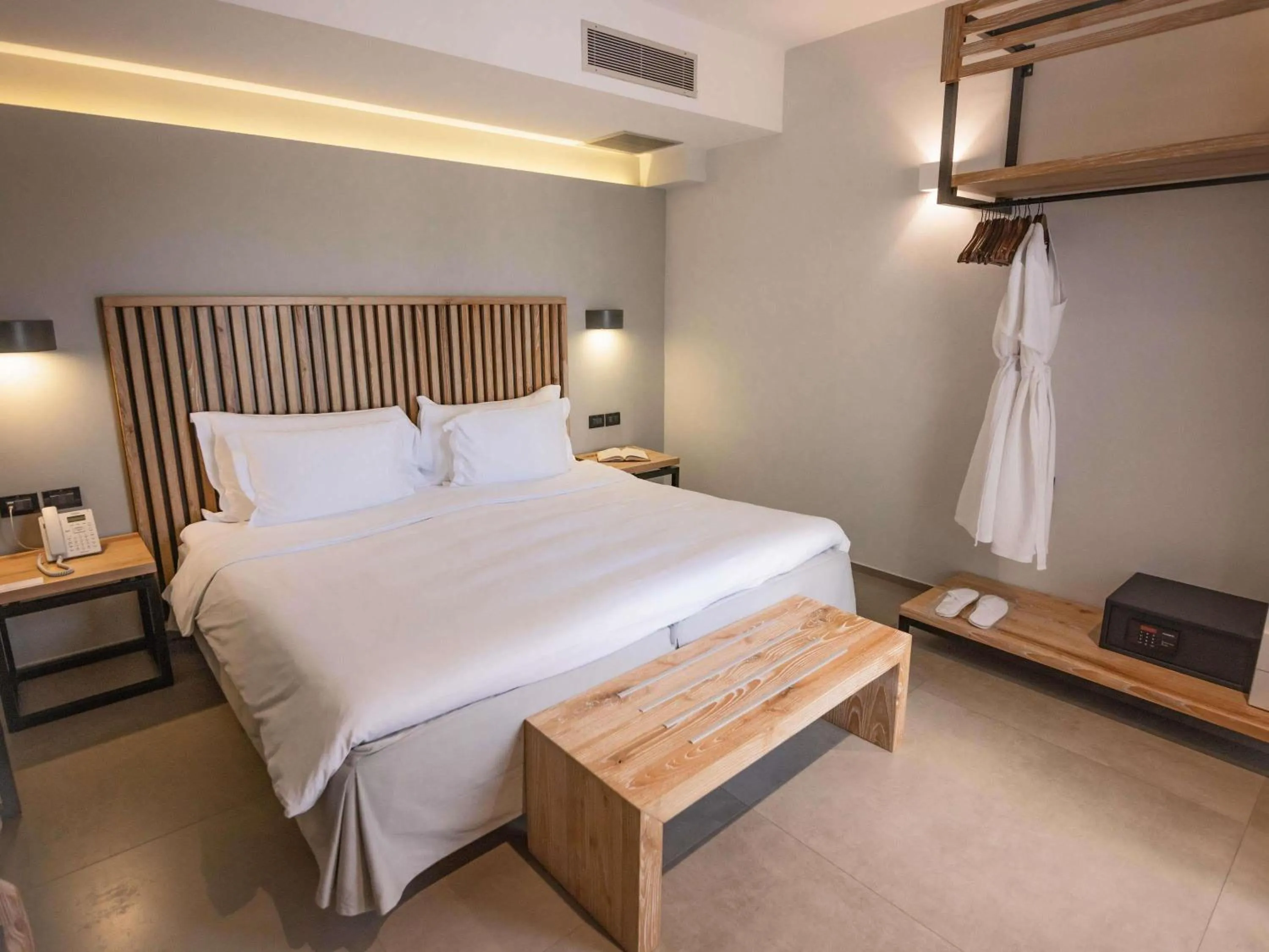 Bedroom, Bed in Movenpick Resort Agios Nikolaos Sivota