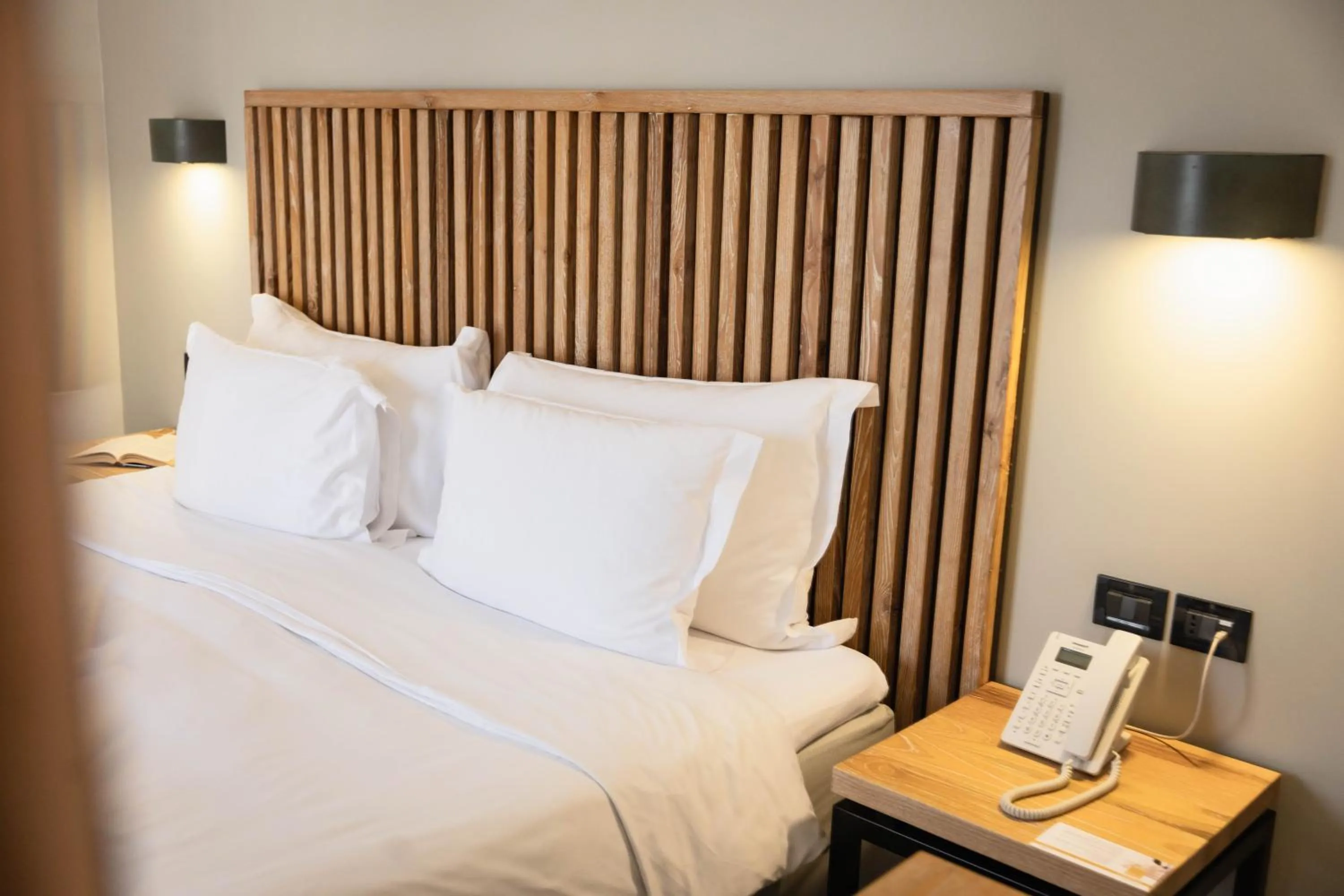 Bed in Movenpick Resort Agios Nikolaos Sivota