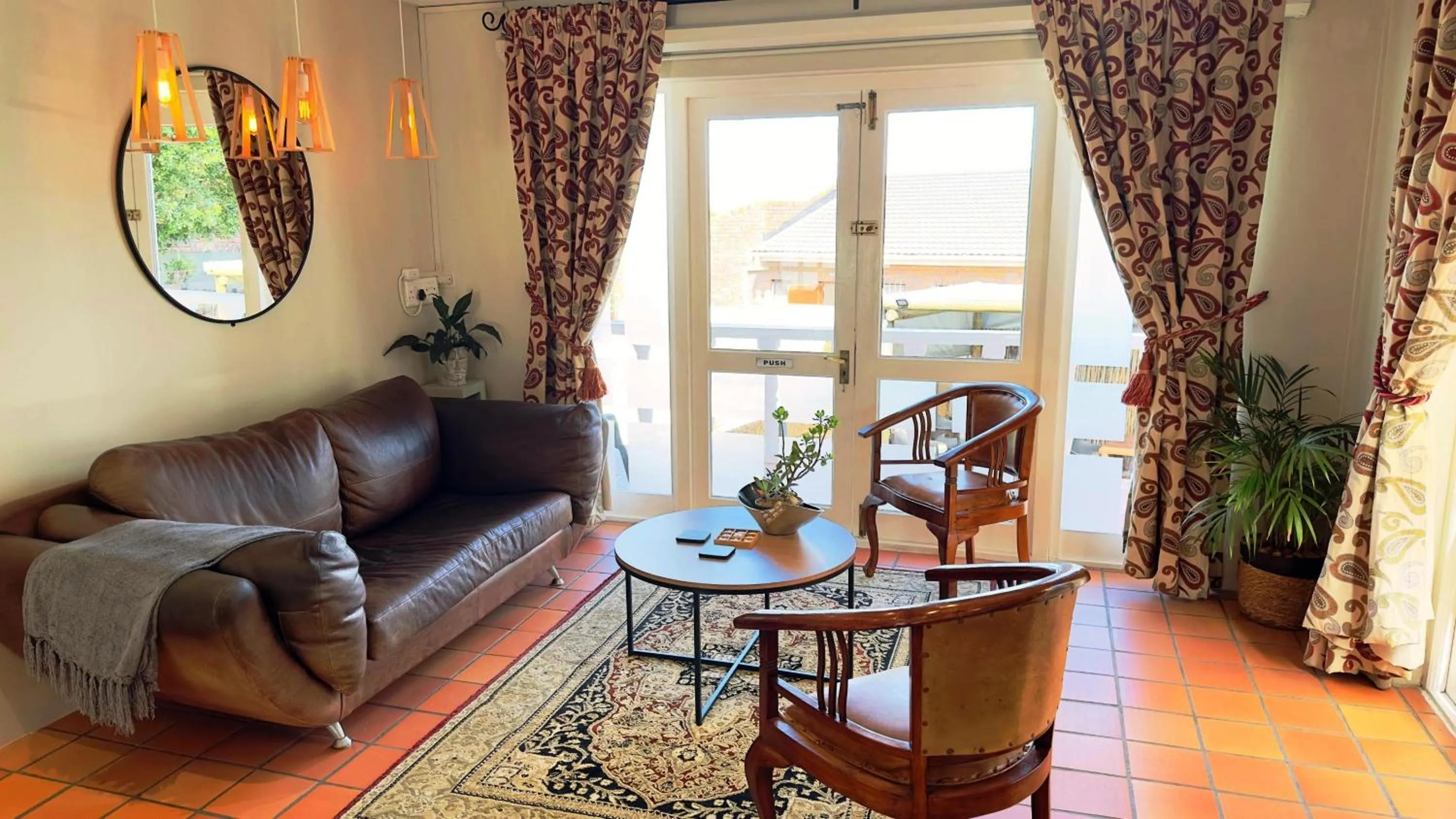 Communal lounge/ TV room in Plattekloof Premium Lodge