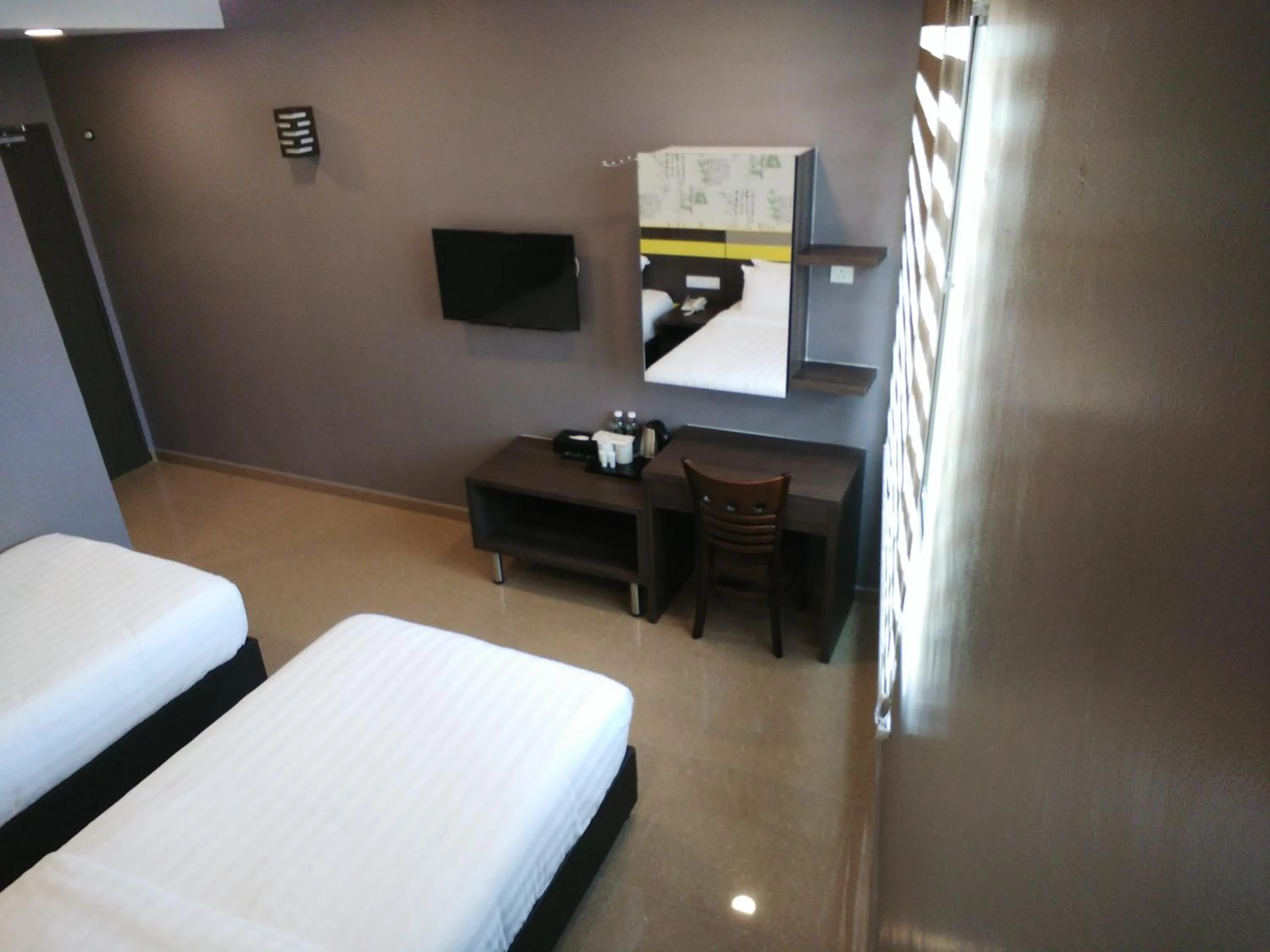 Bed in Kampar Boutique Hotel