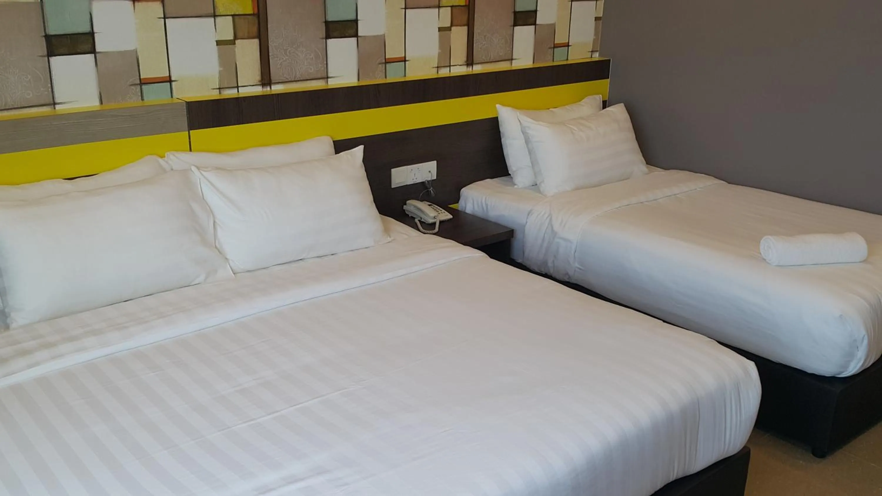 Bed in Kampar Boutique Hotel