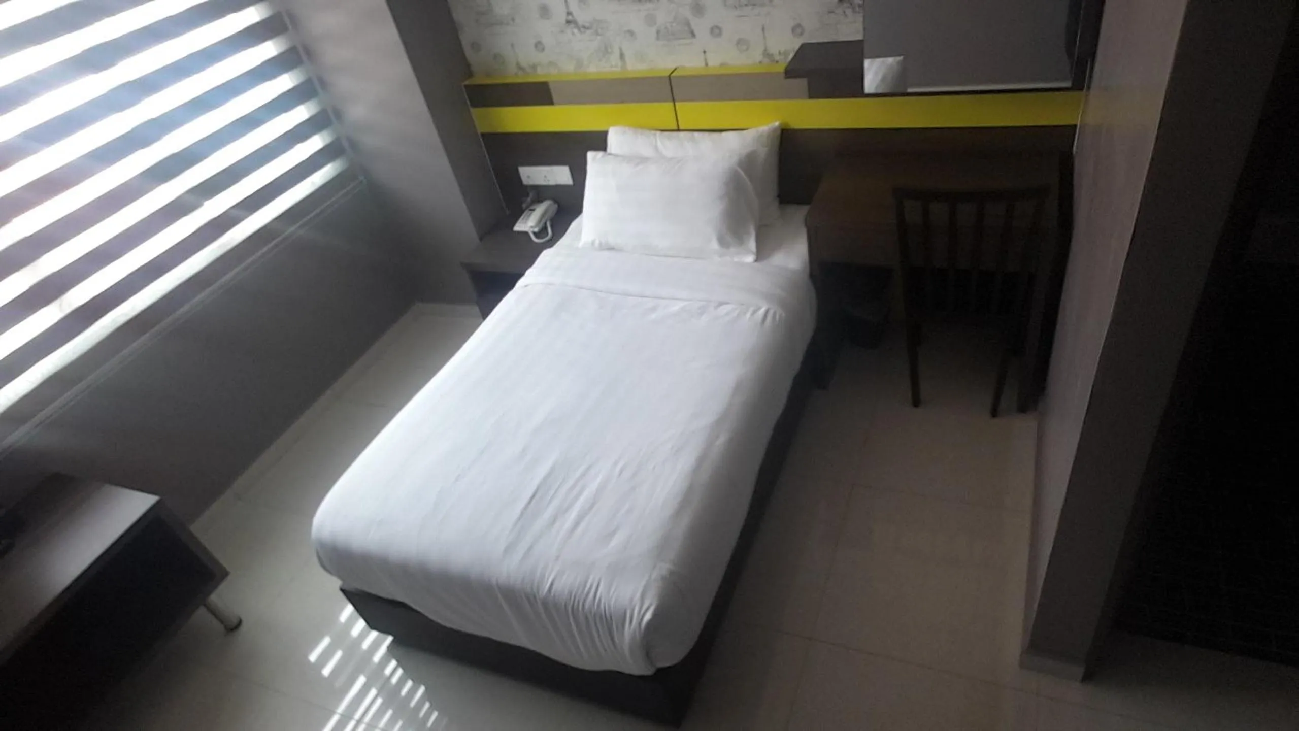 Bed in Kampar Boutique Hotel
