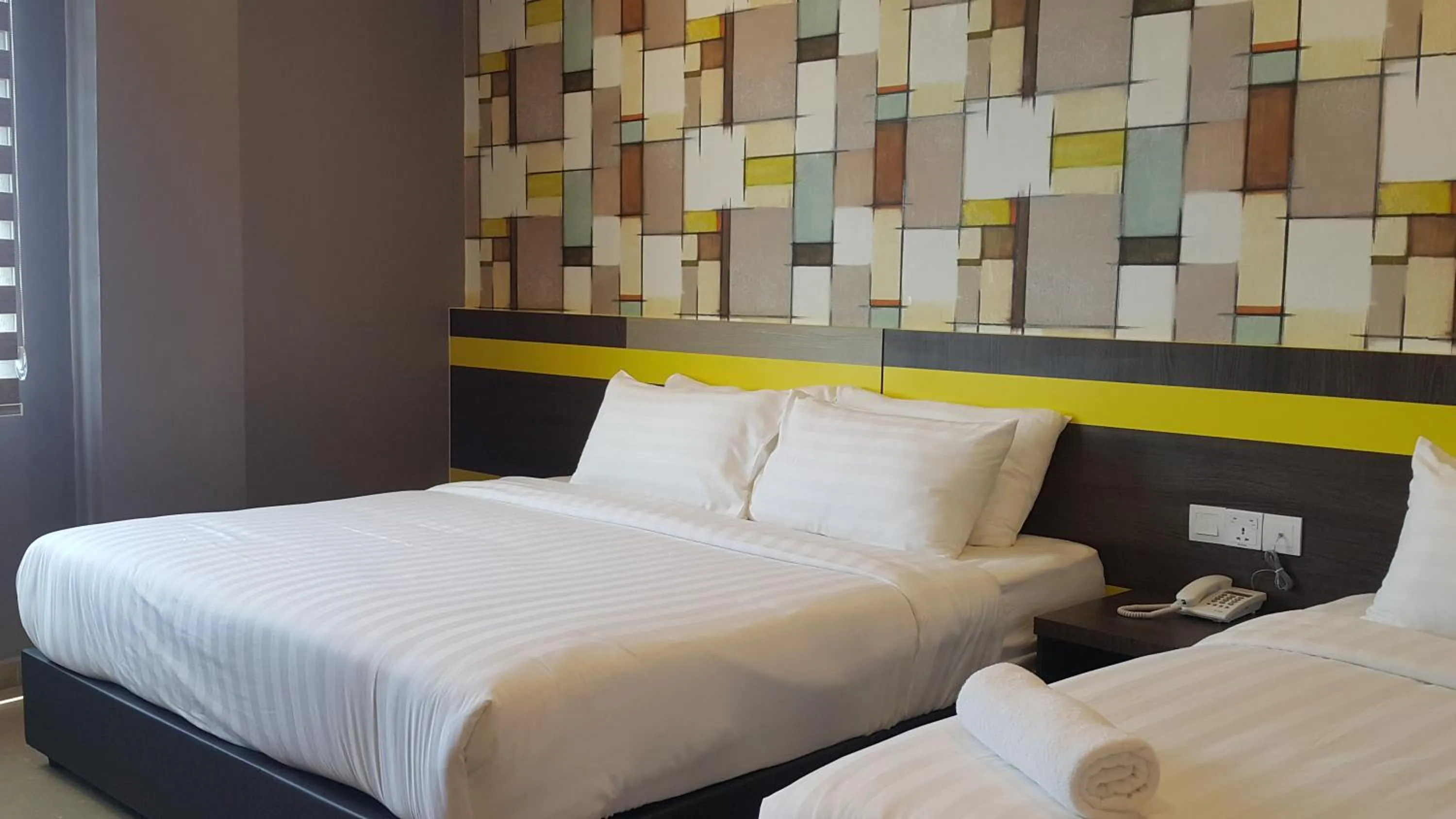 Bed in Kampar Boutique Hotel