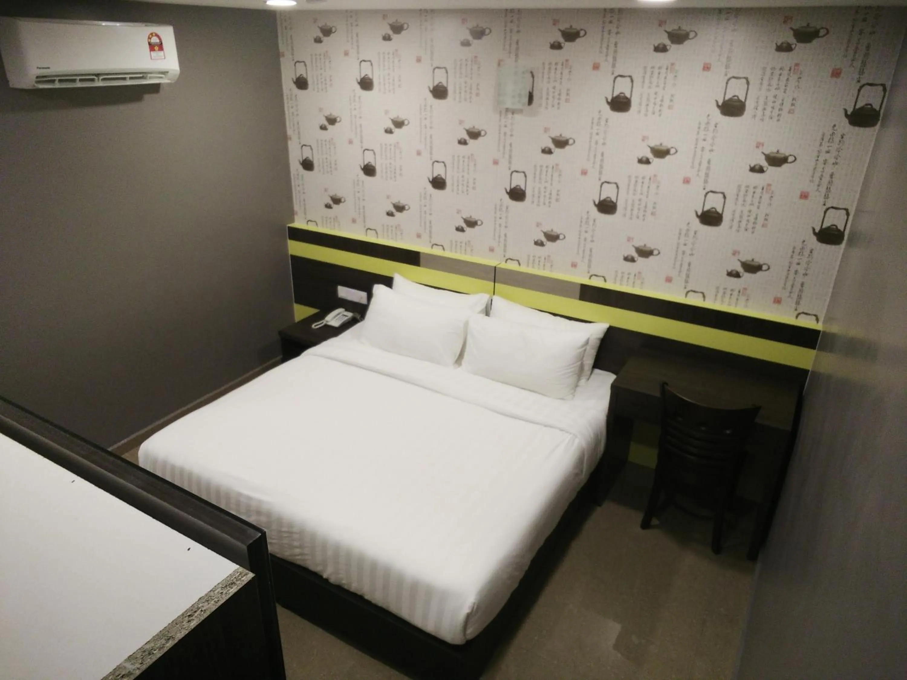 Bed in Kampar Boutique Hotel