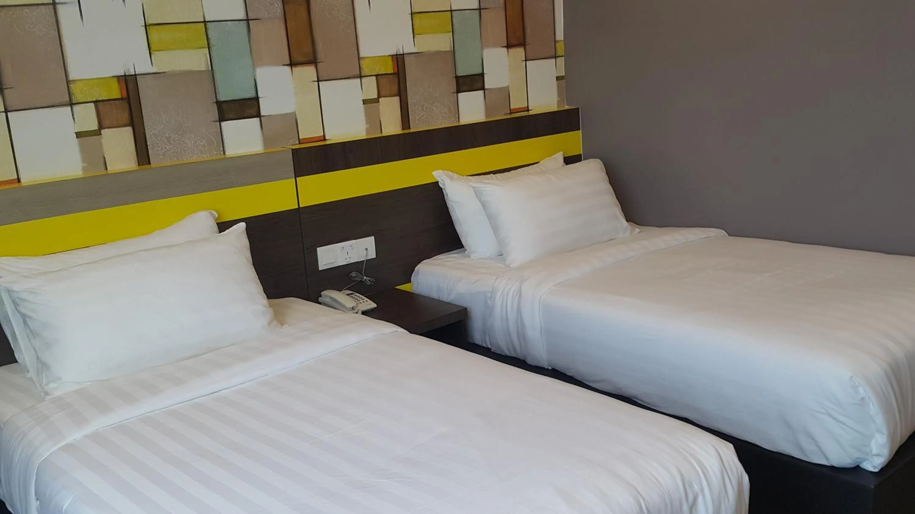 Bed in Kampar Boutique Hotel