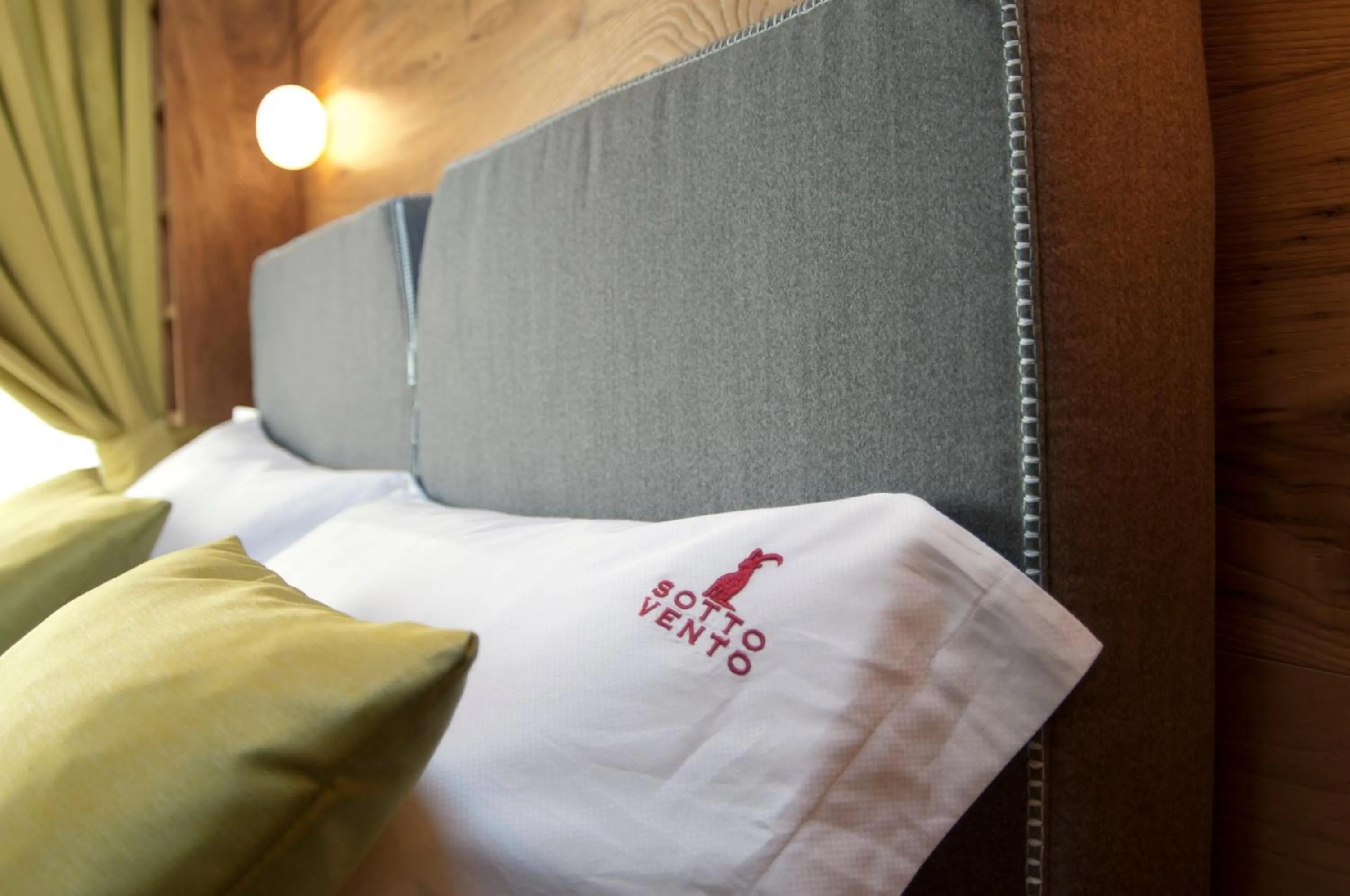 Bed in Sottovento Luxury Hospitality