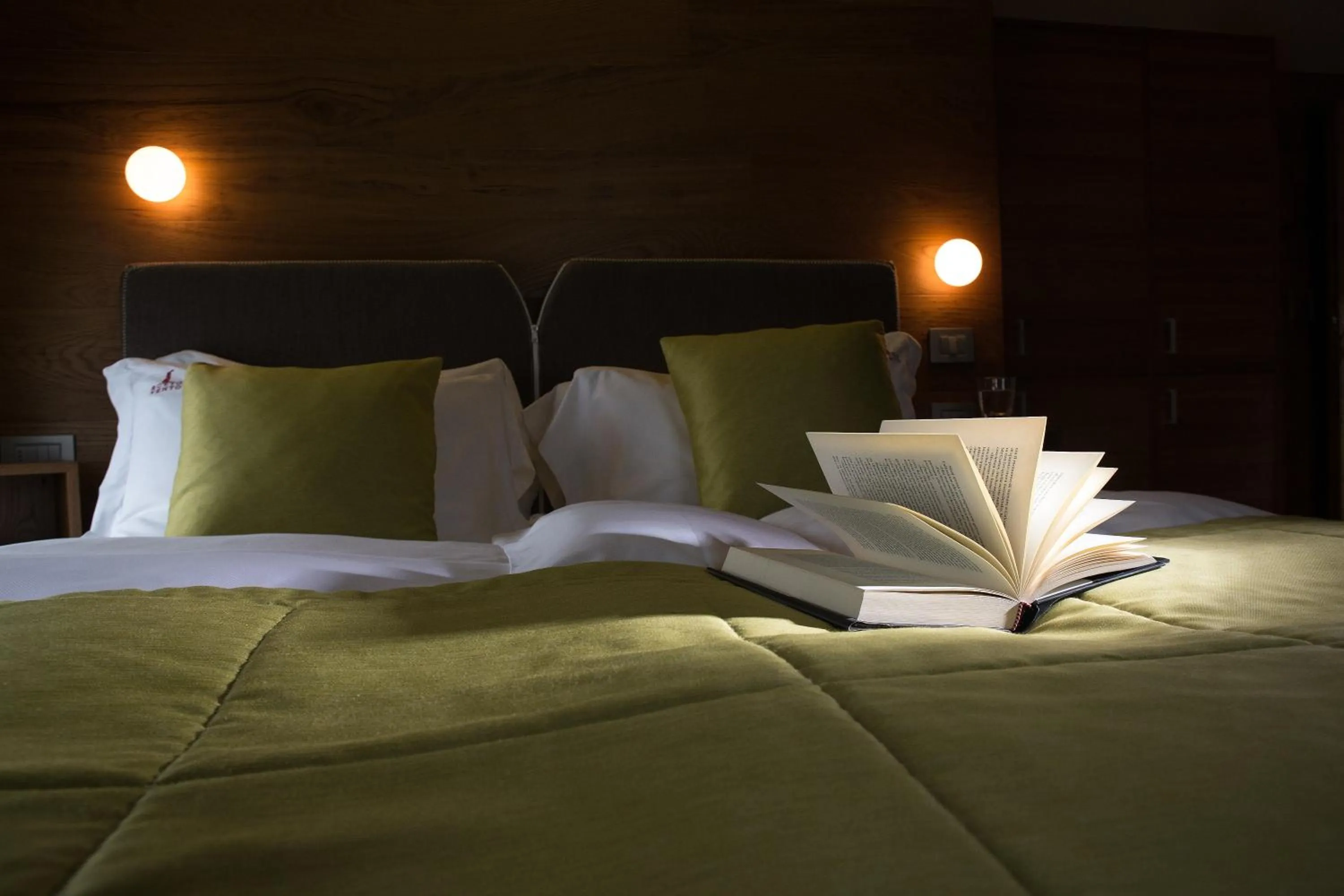 Bed in Sottovento Luxury Hospitality