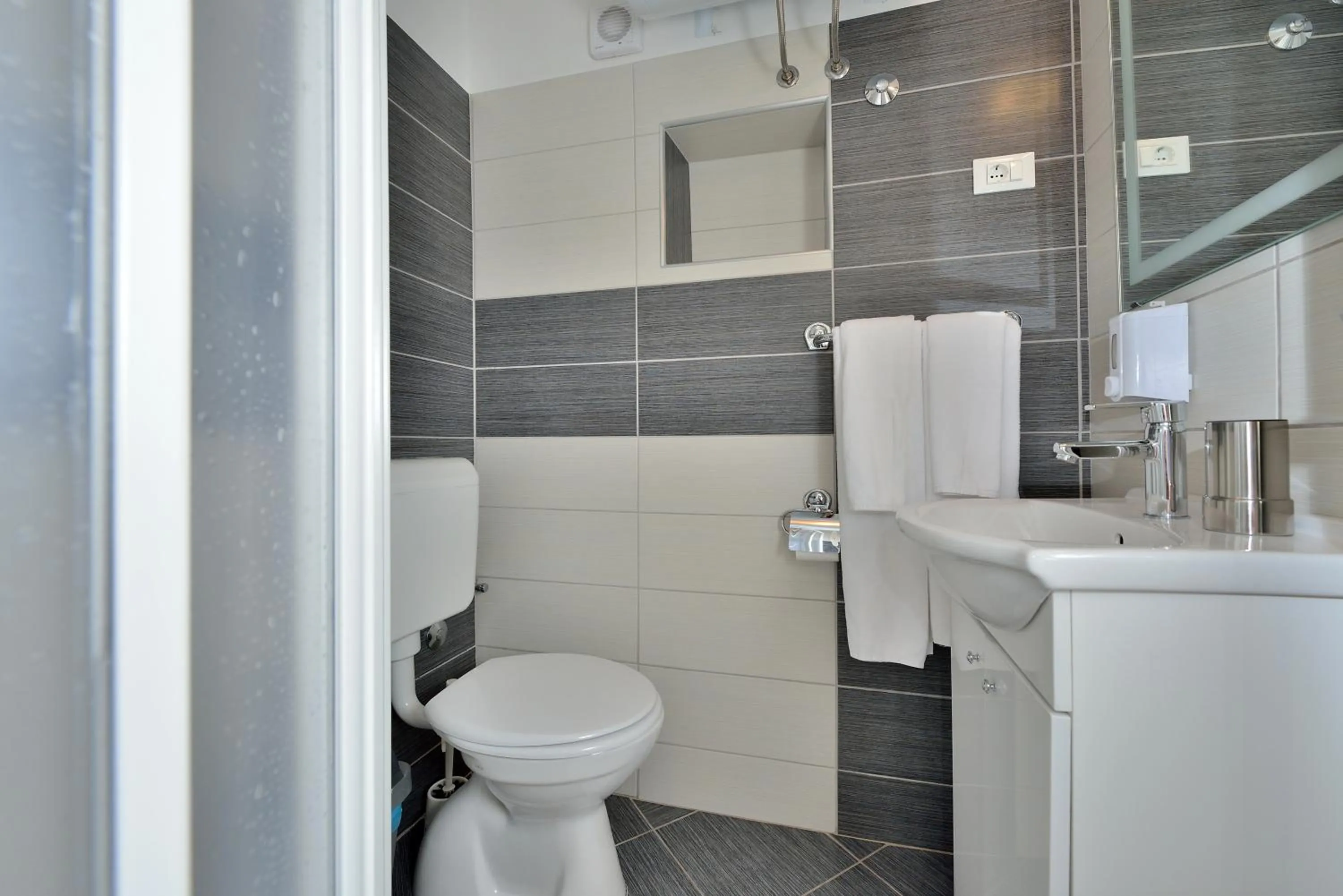 Bathroom in Apartments Donat