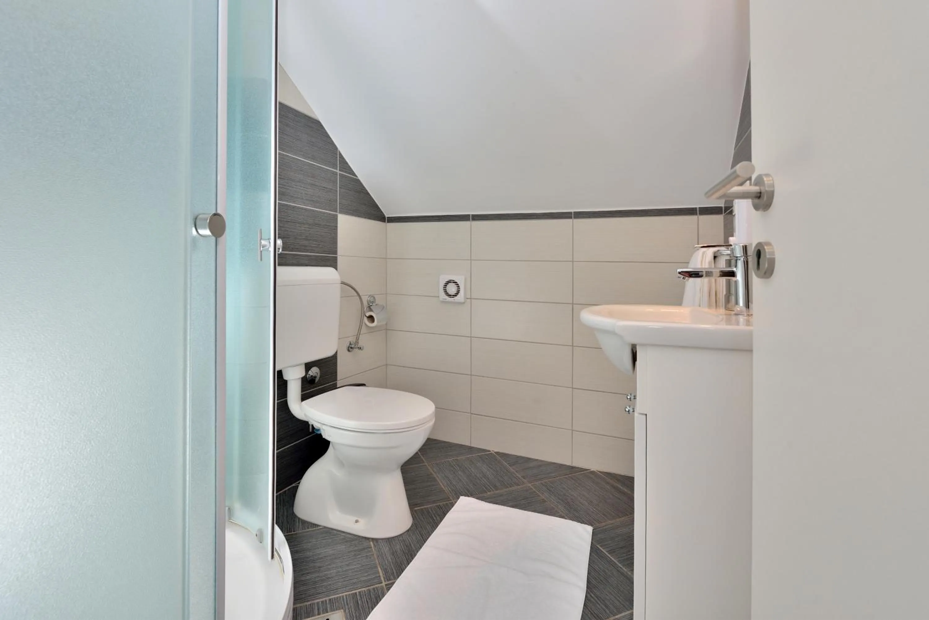 Bathroom in Apartments Donat