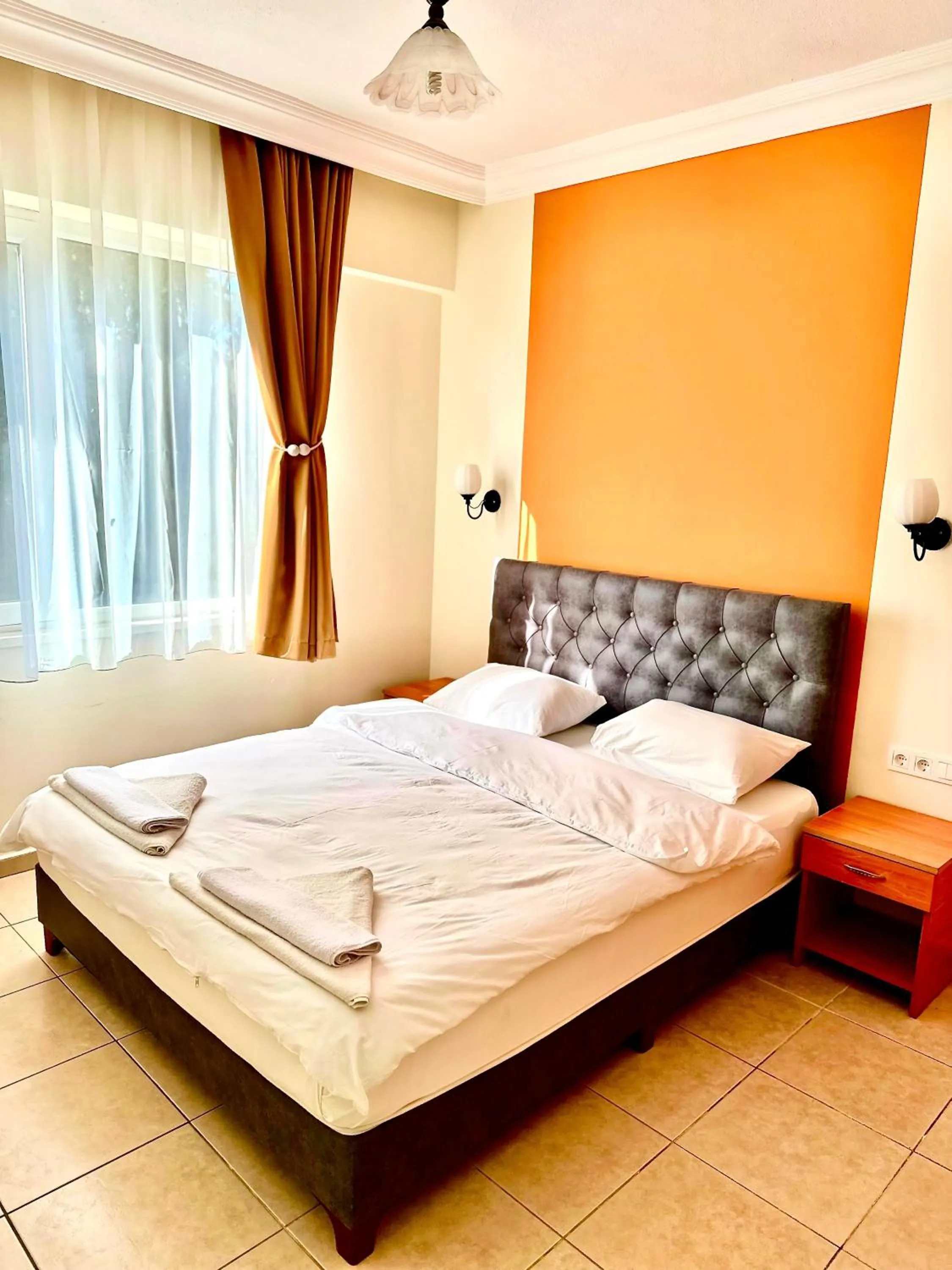 Bed in Melissa Garden Apart Hotel