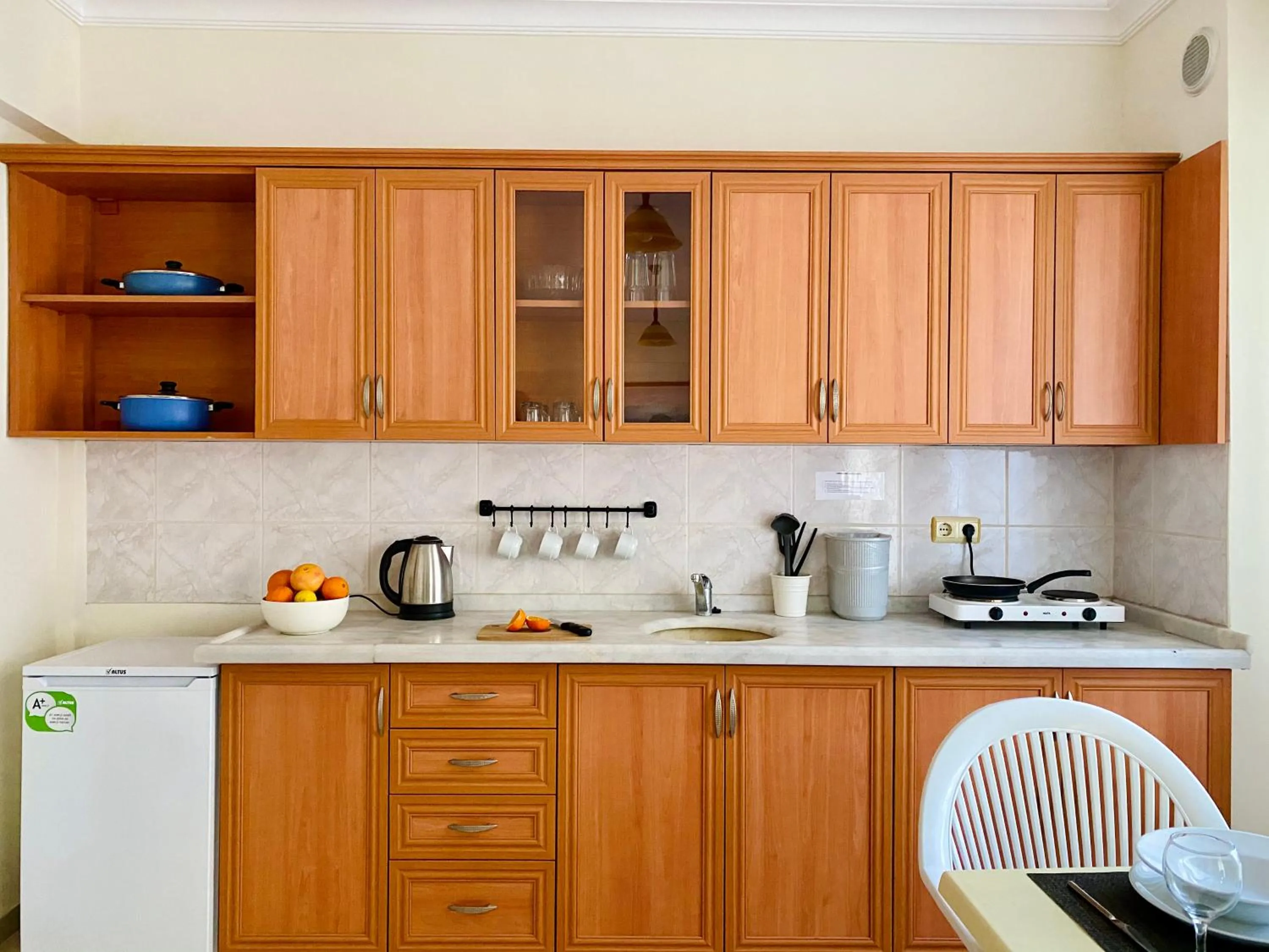 Kitchen or kitchenette in Melissa Garden Apart Hotel