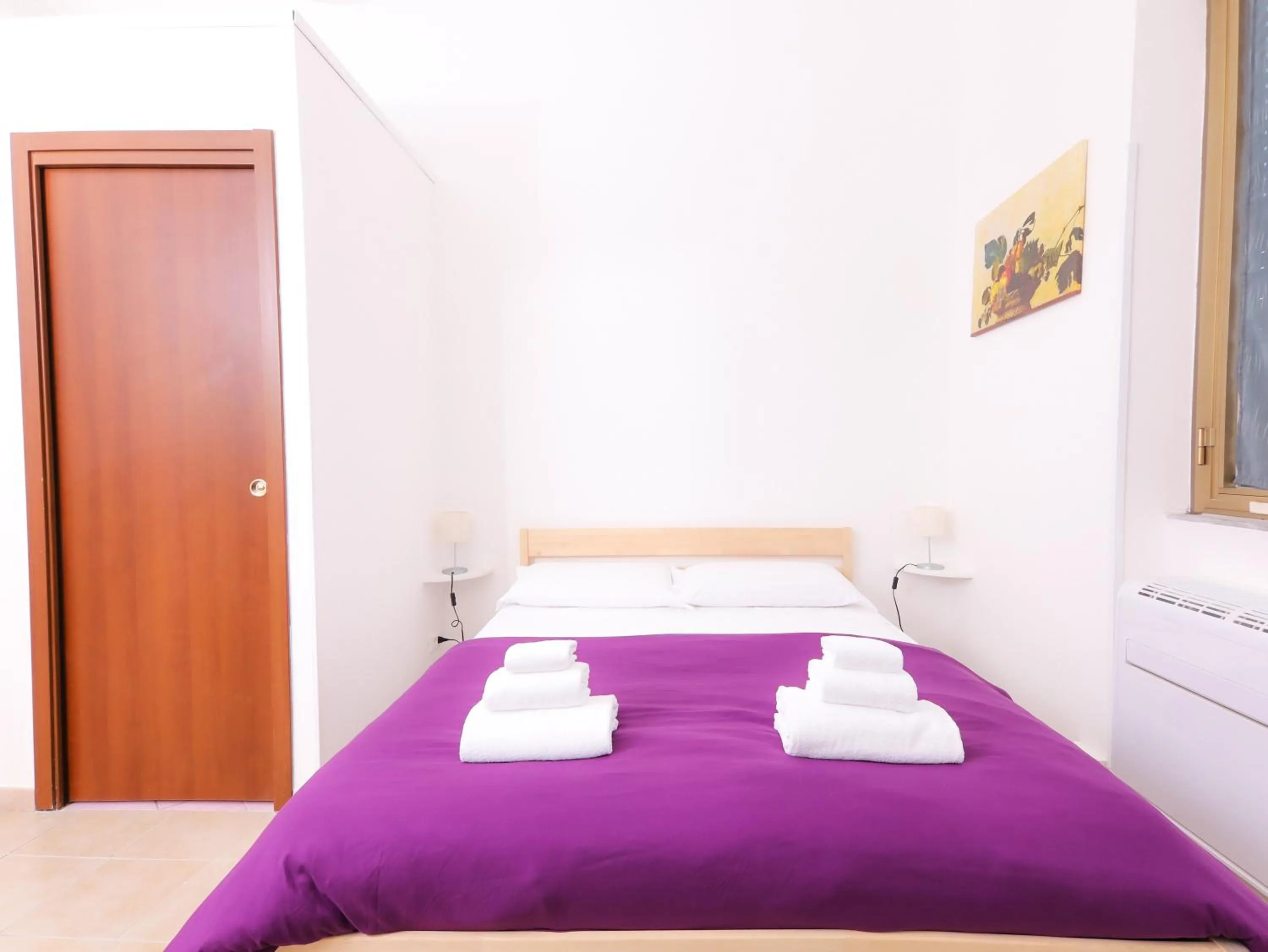 Bed in Cielo Vaticano Guest House