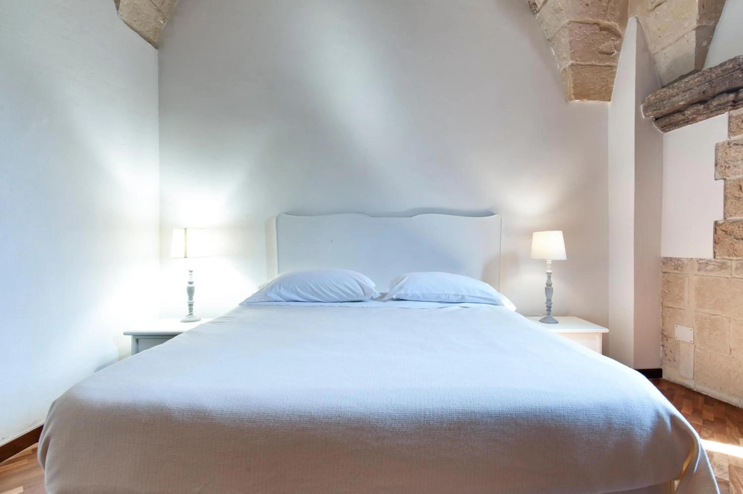 Photo of the whole room, Bed in Chiesa Greca Suites - Lecce Selection