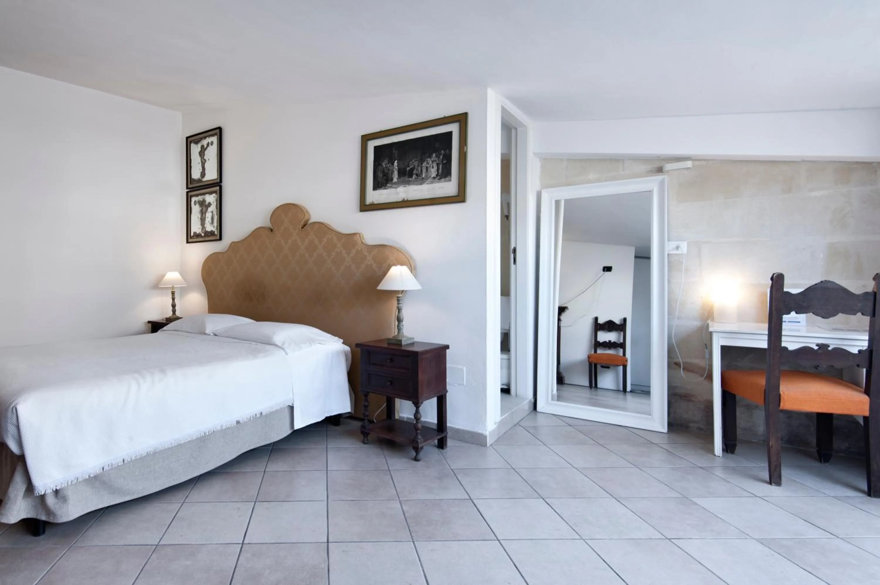 Photo of the whole room, Bed in Chiesa Greca Suites - Lecce Selection
