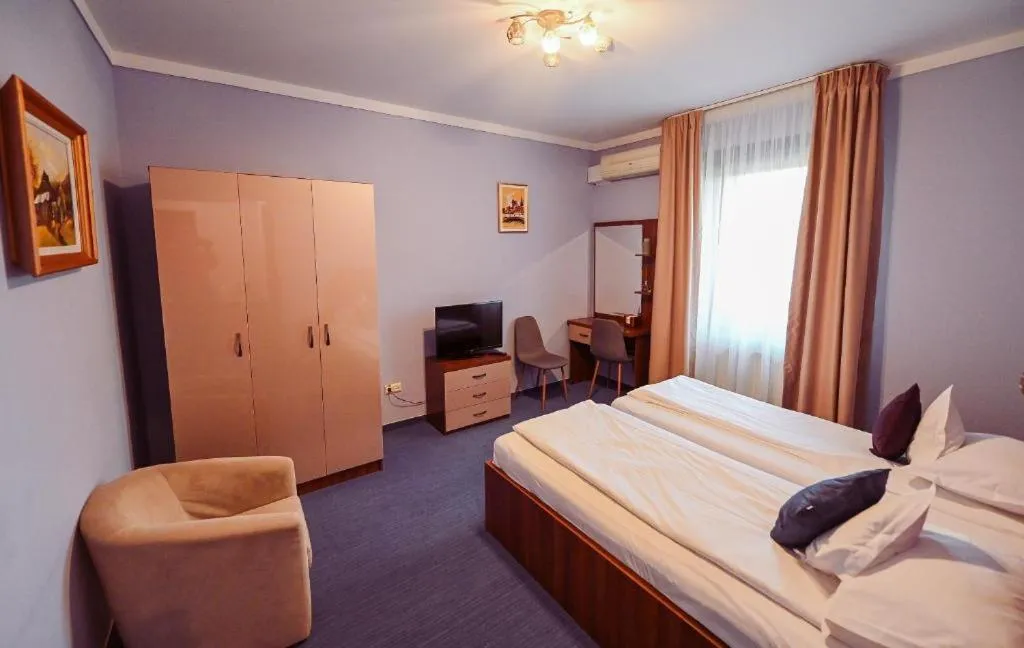 Photo of the whole room, Bed in Conacul Domnesc