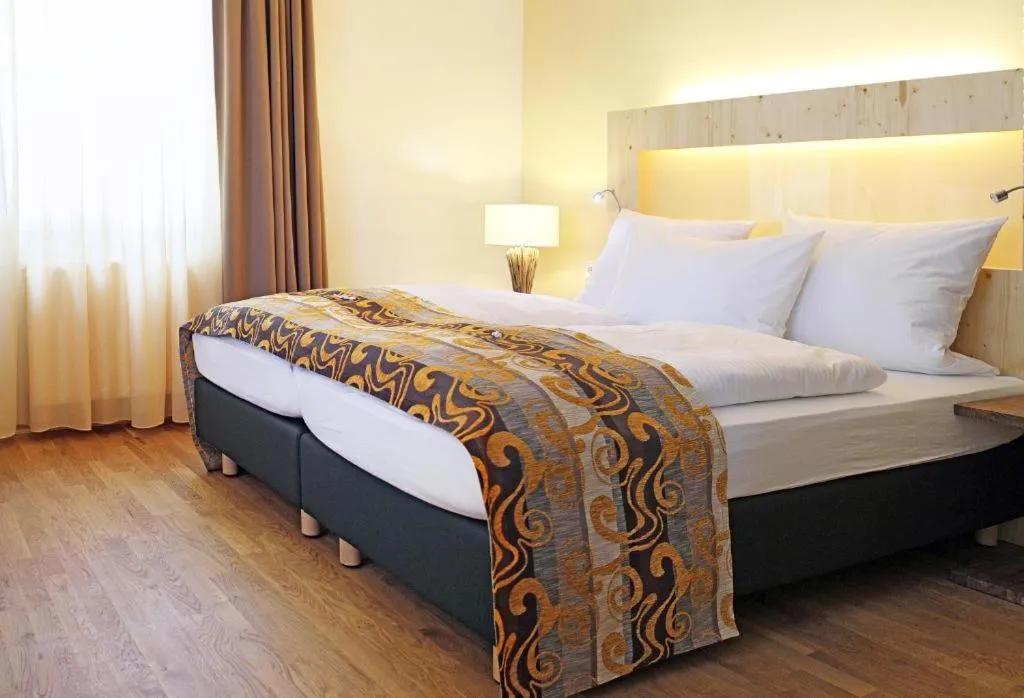 Bed in GROSCH Brauhotel & Gasthof