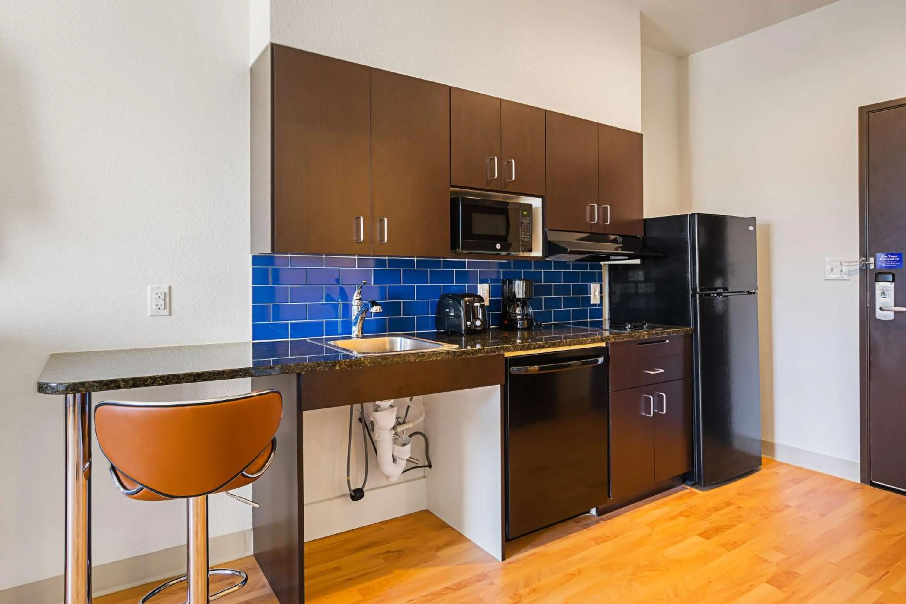 Kitchen or kitchenette in Studio 6-Buda, TX