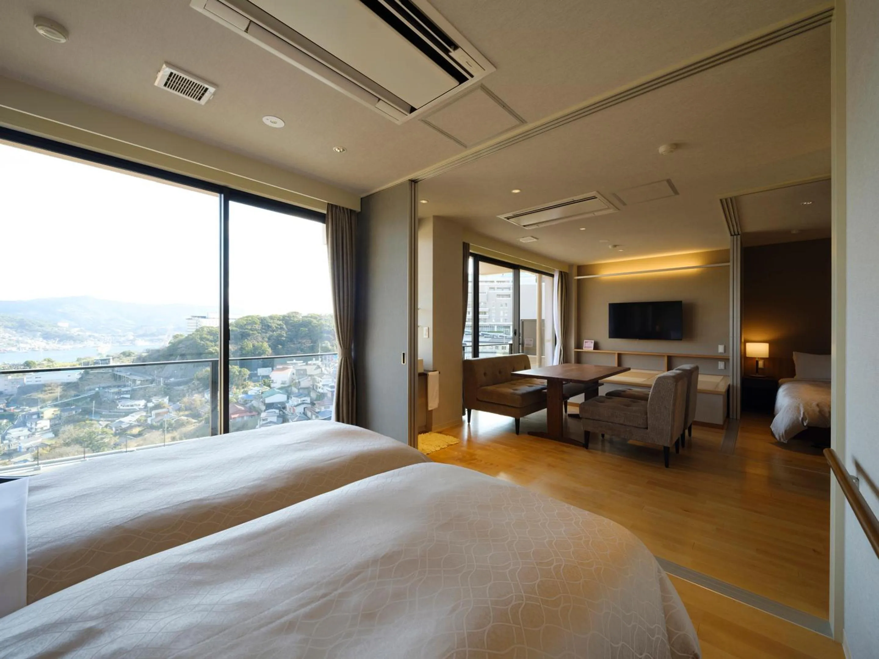 Living room, Bed in Inasayama Kanko Hotel