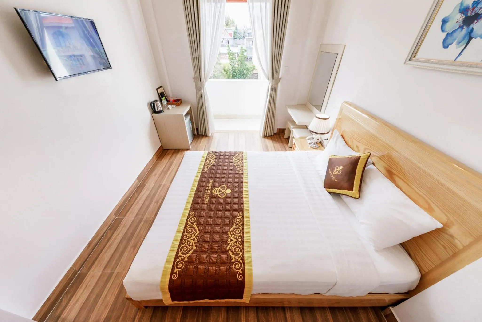 Bed in Golden Bee Hotel