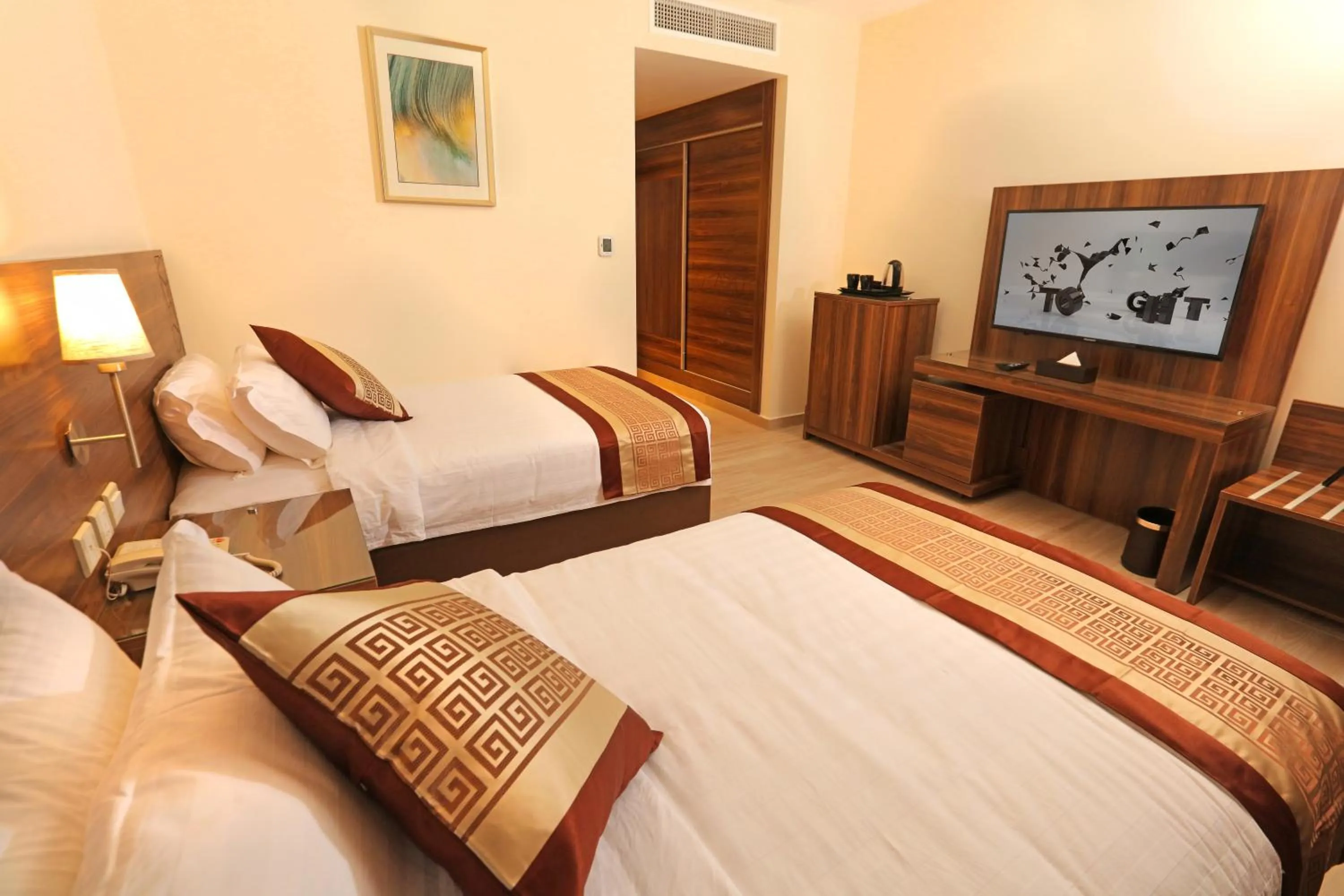 Bed in Lacosta Hotel