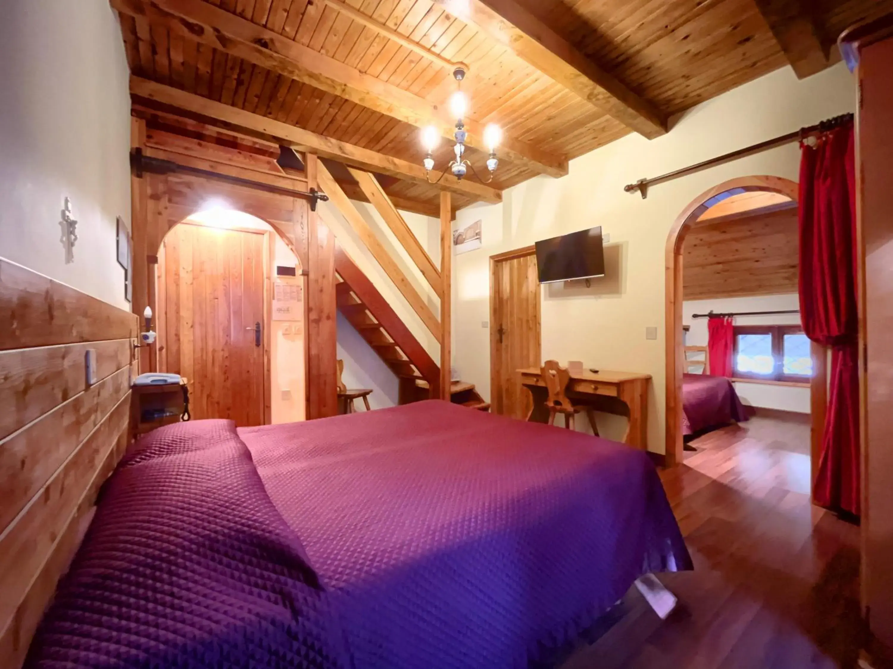 Quadruple Room in Hotel Garnì Mille Pini Quadruple Room in Hotel Garnì Mille Pini