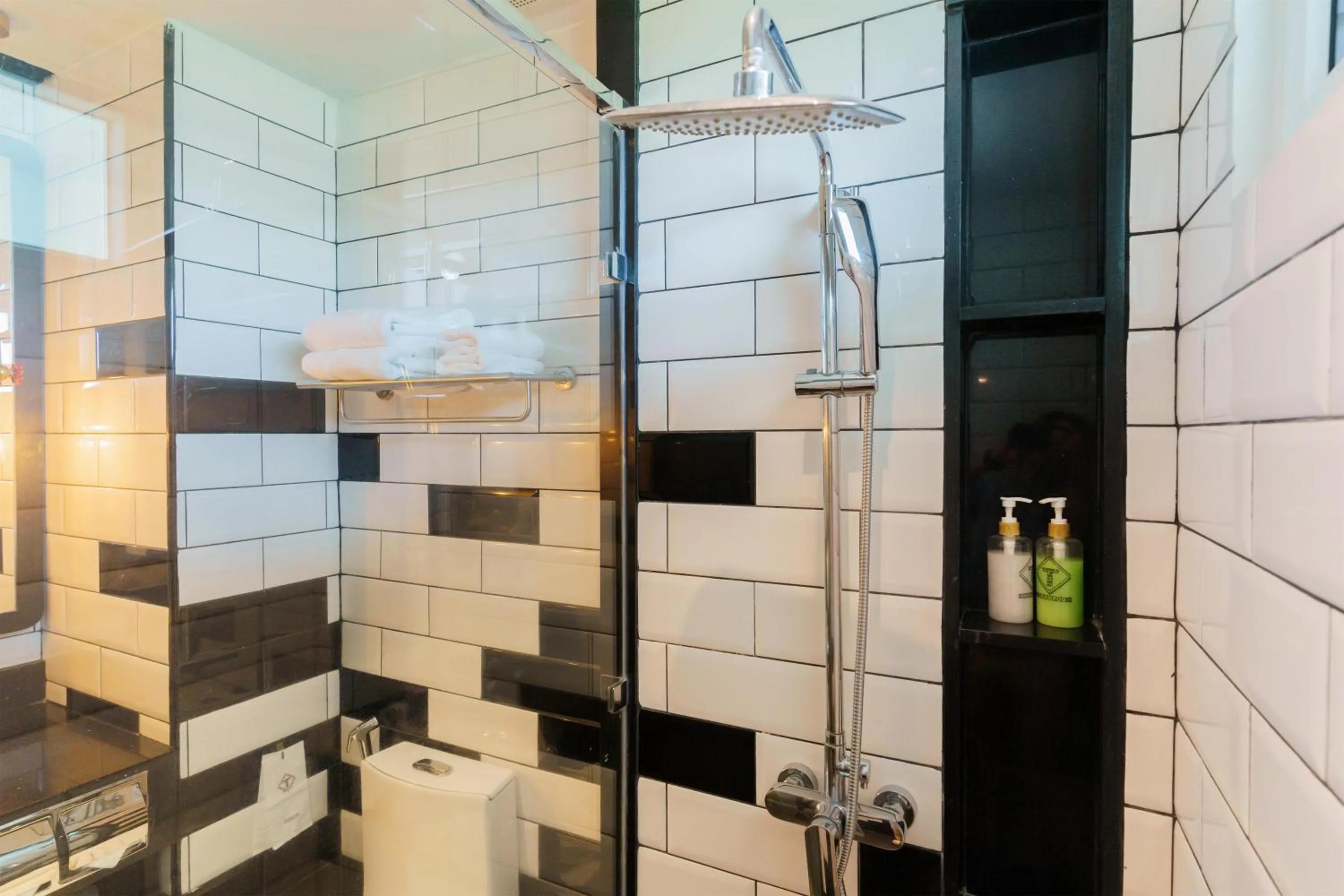 Bathroom in SureStay Plus by Best Western T Pattaya