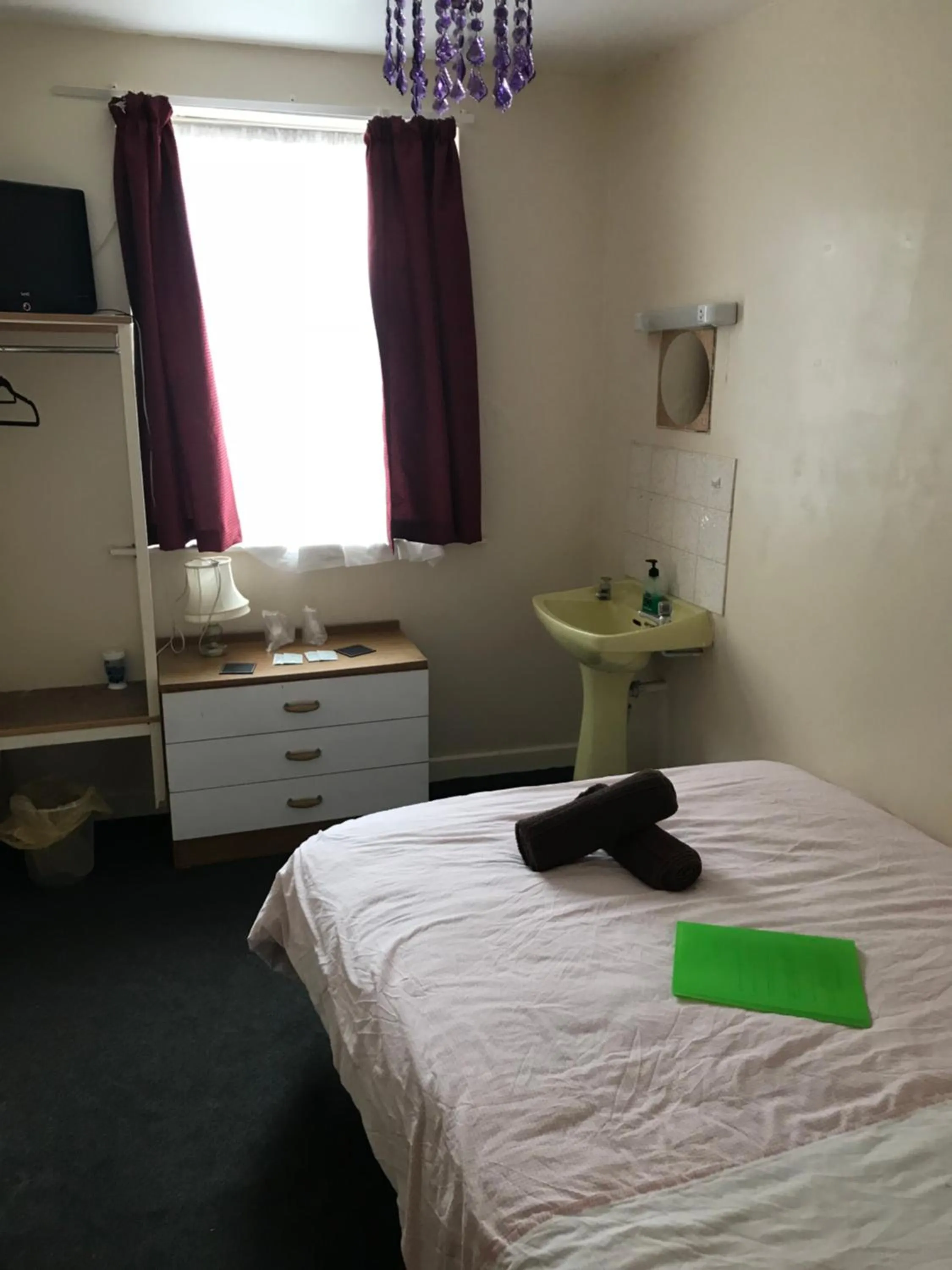 Bed in The Merlin Hotel