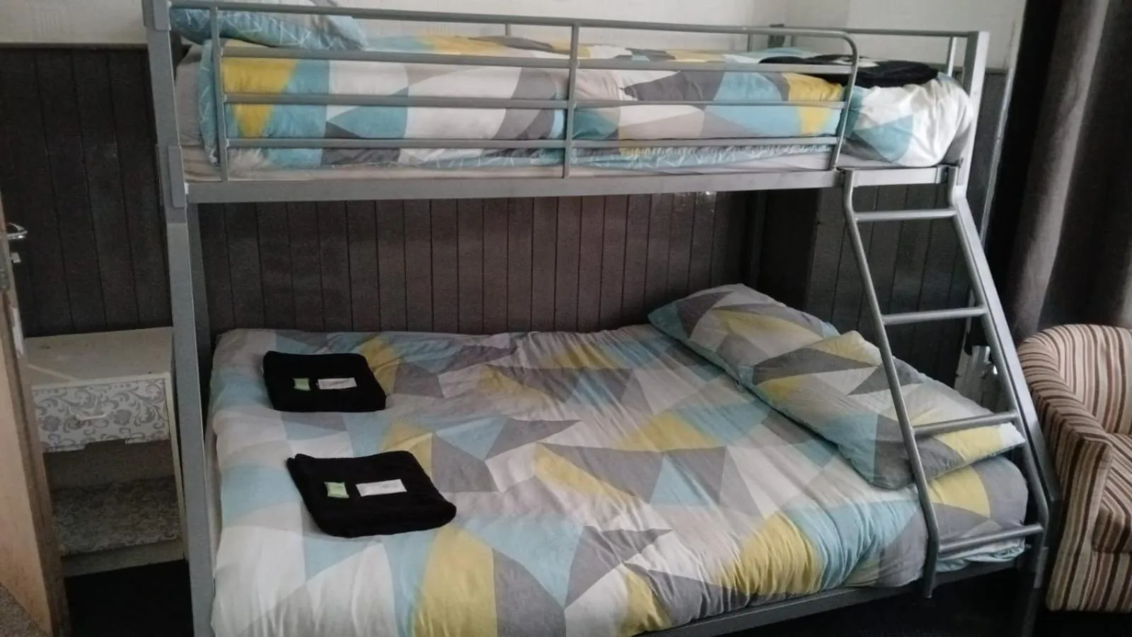 Bed in The Merlin Hotel