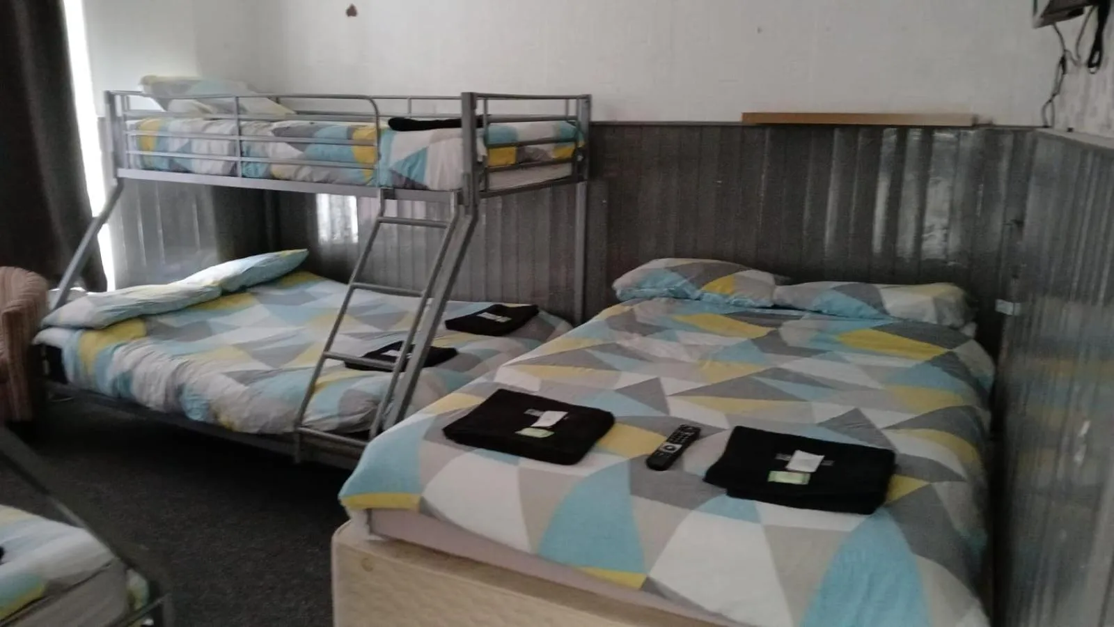 Bed in The Merlin Hotel