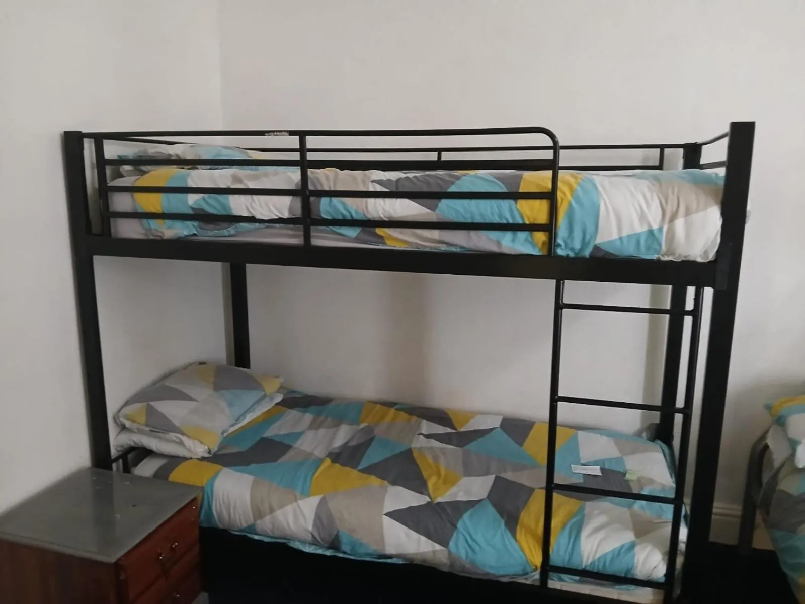 Bed in The Merlin Hotel