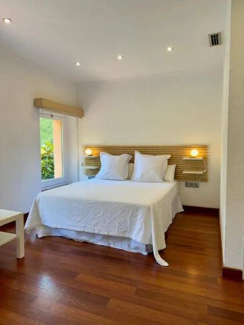 Bedroom, Bed in Hotel Spa La Central - Adults Only