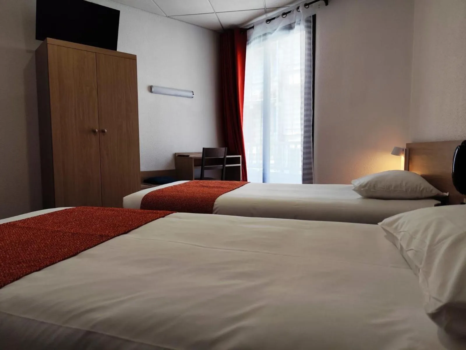 Photo of the whole room, Bed in Hôtel Hélianthe