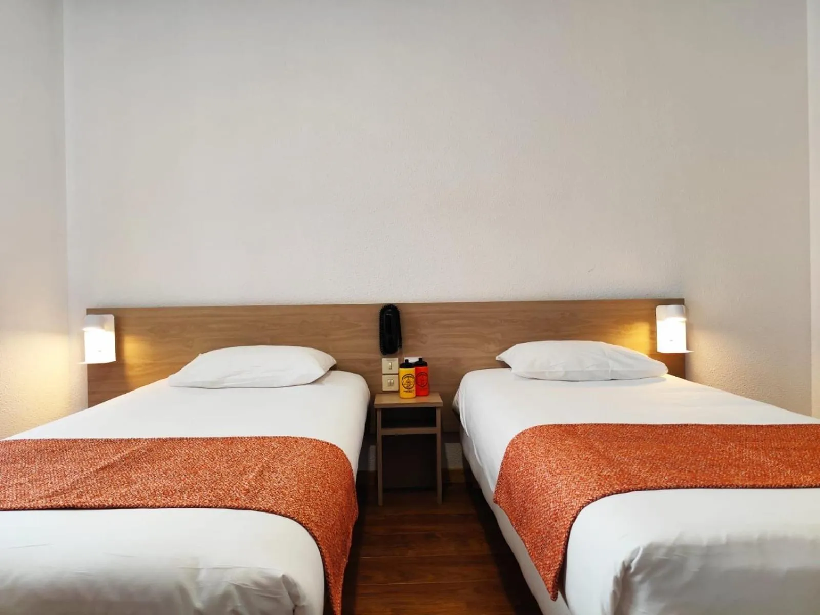 Photo of the whole room, Bed in Hôtel Hélianthe