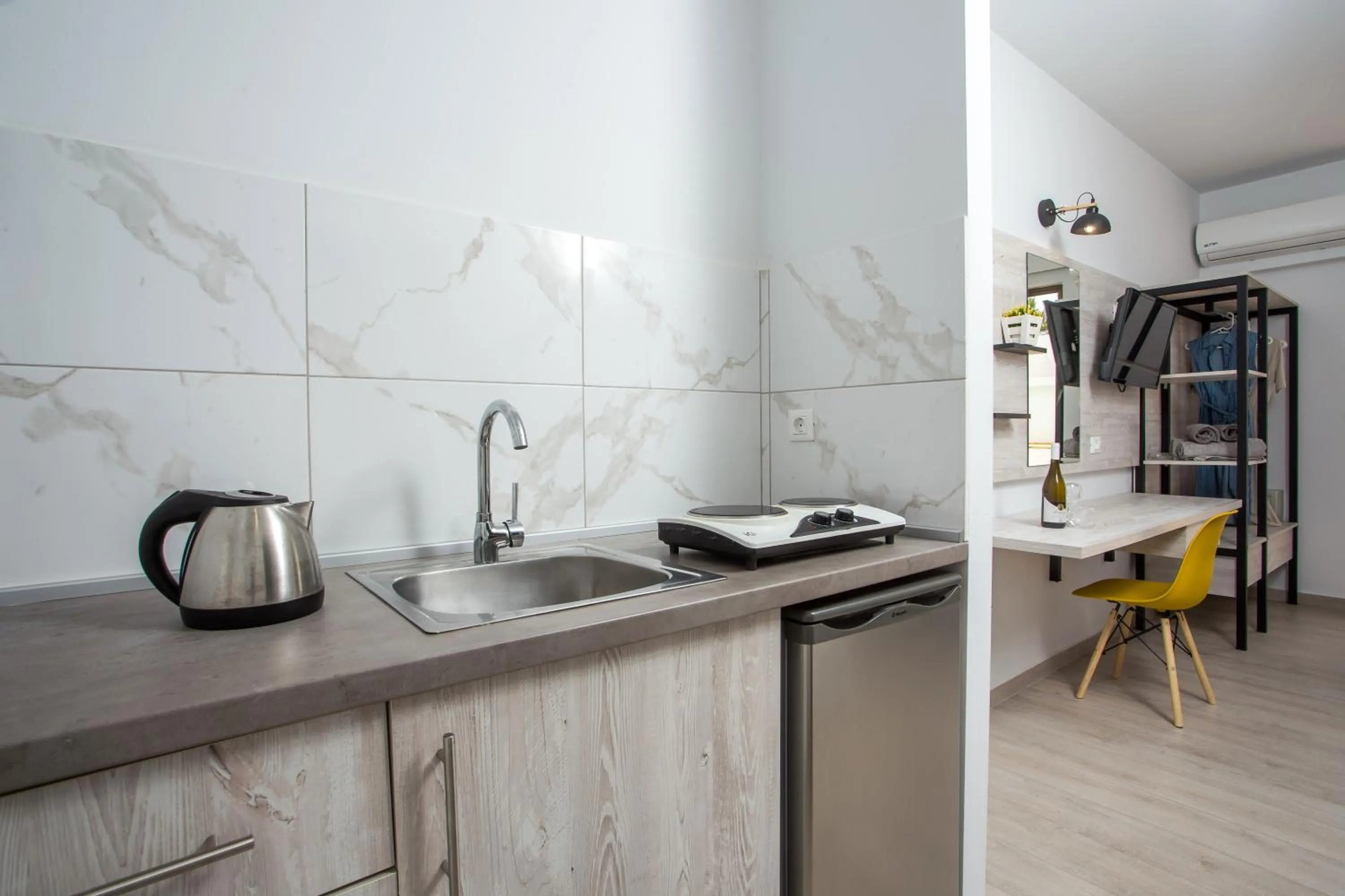 Kitchen or kitchenette in CasaStavris - Aparts & Pool Suites