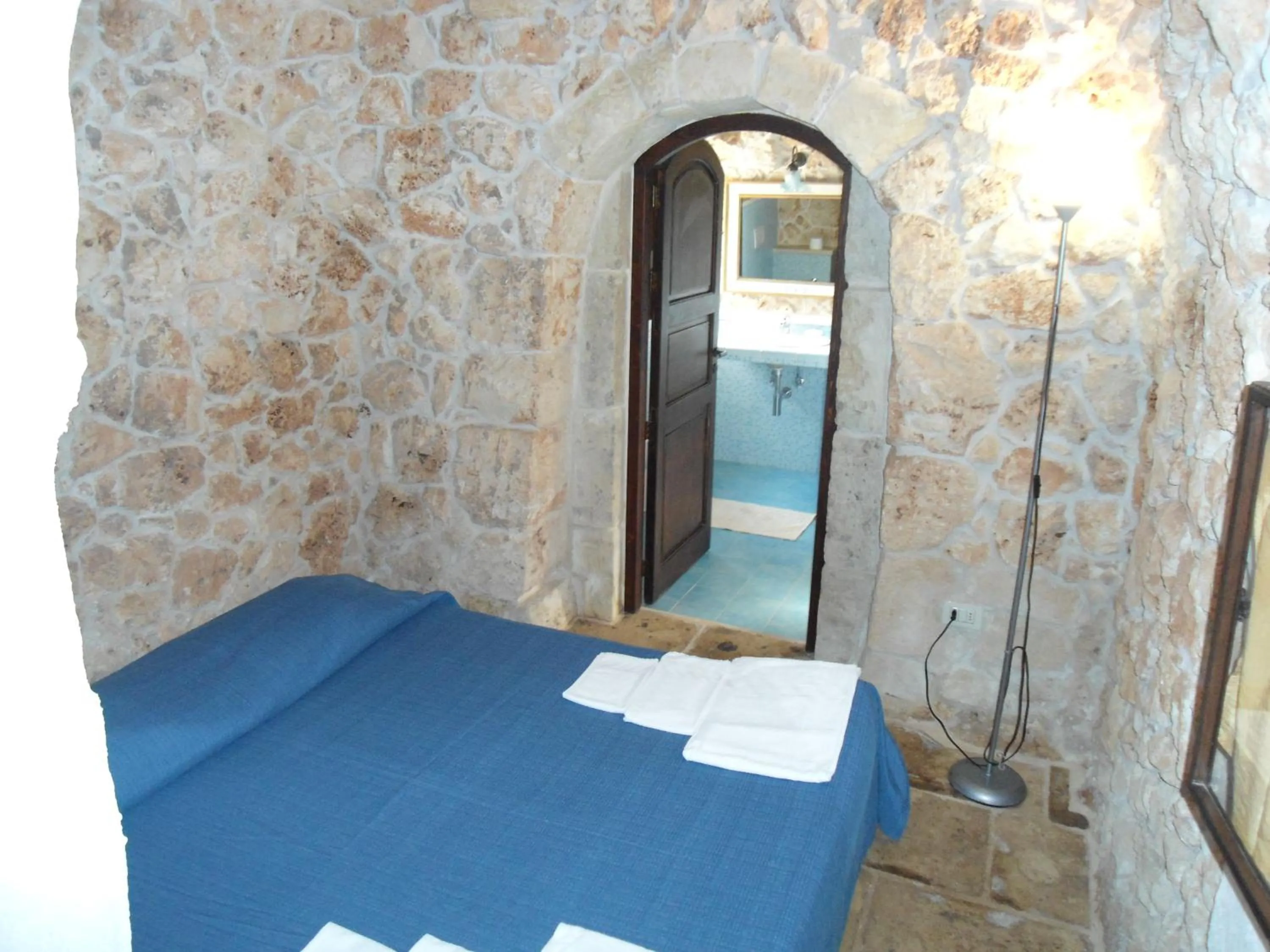 Decorative detail, Bed in Tenuta Pigliano Hotel