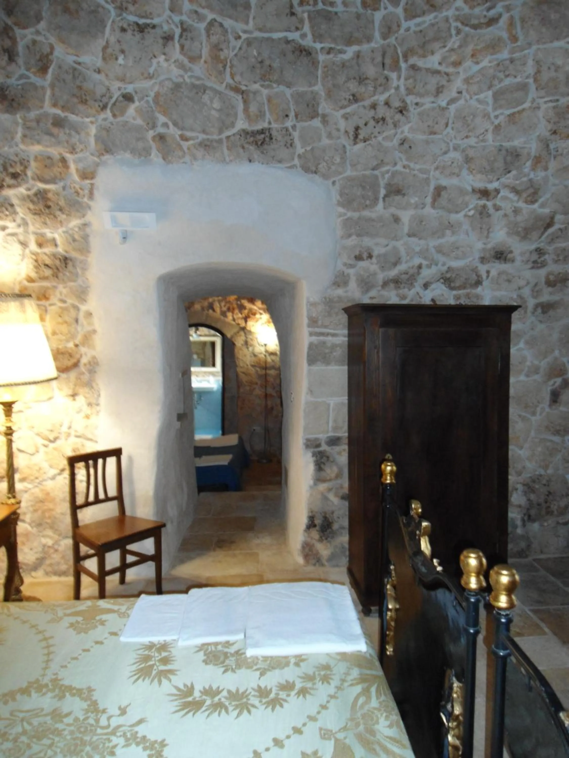Decorative detail, Bed in Tenuta Pigliano Hotel
