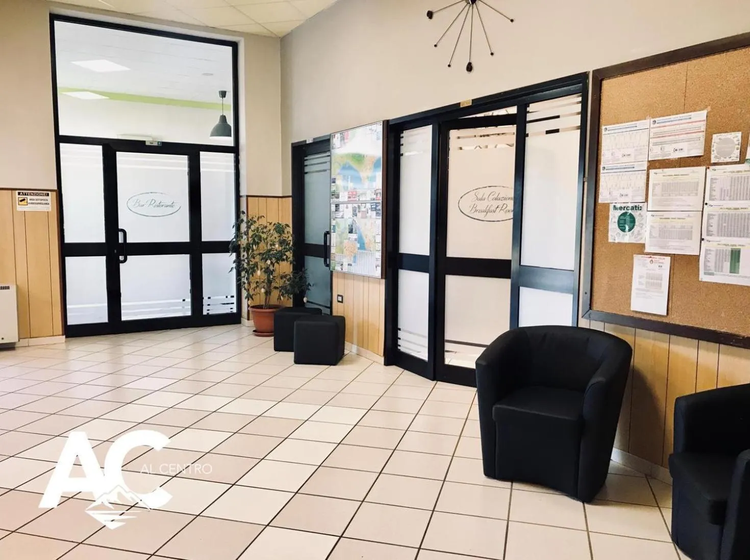 Property logo or sign in Al Centro