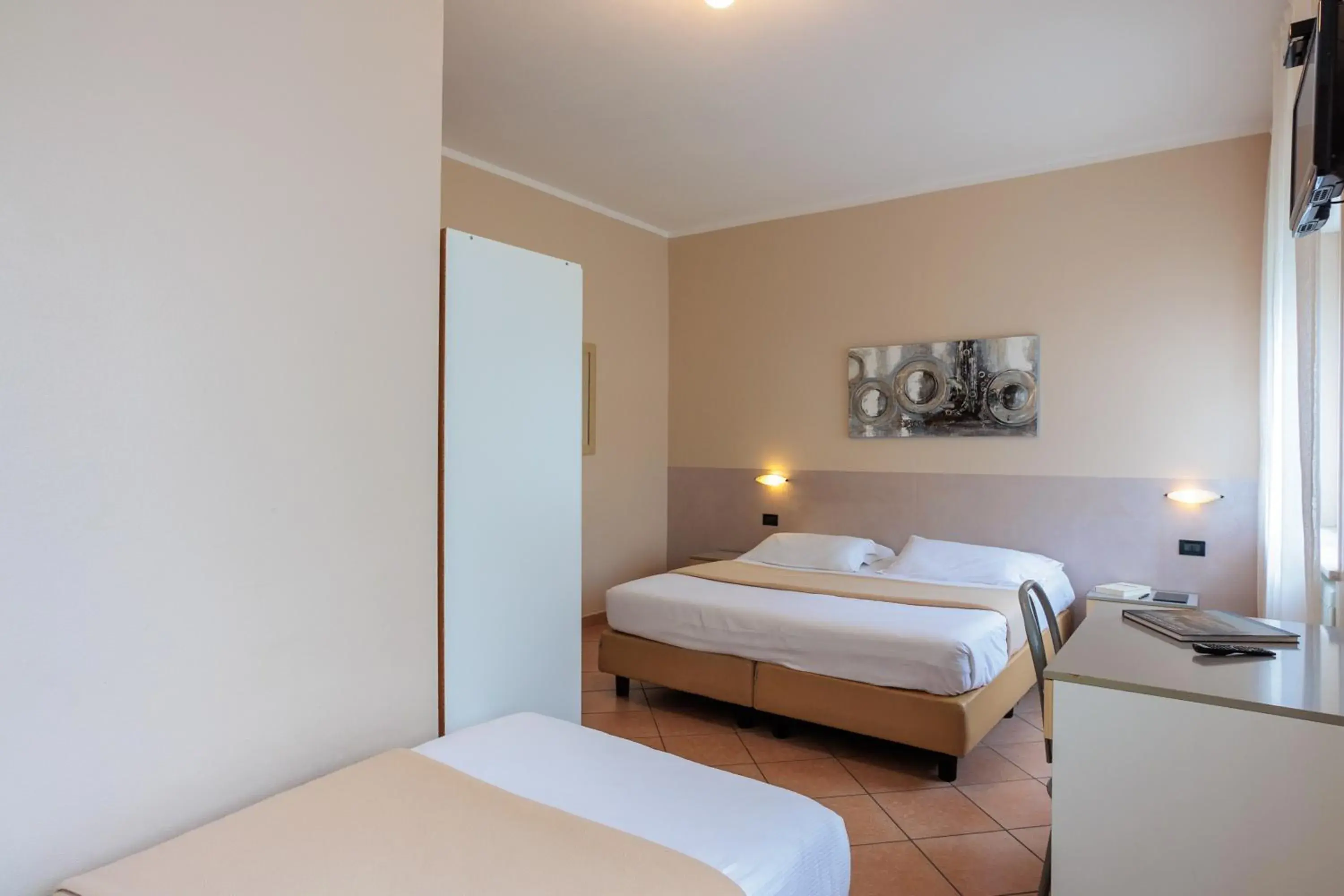 Triple Room in Al Centro Triple Room in Al Centro