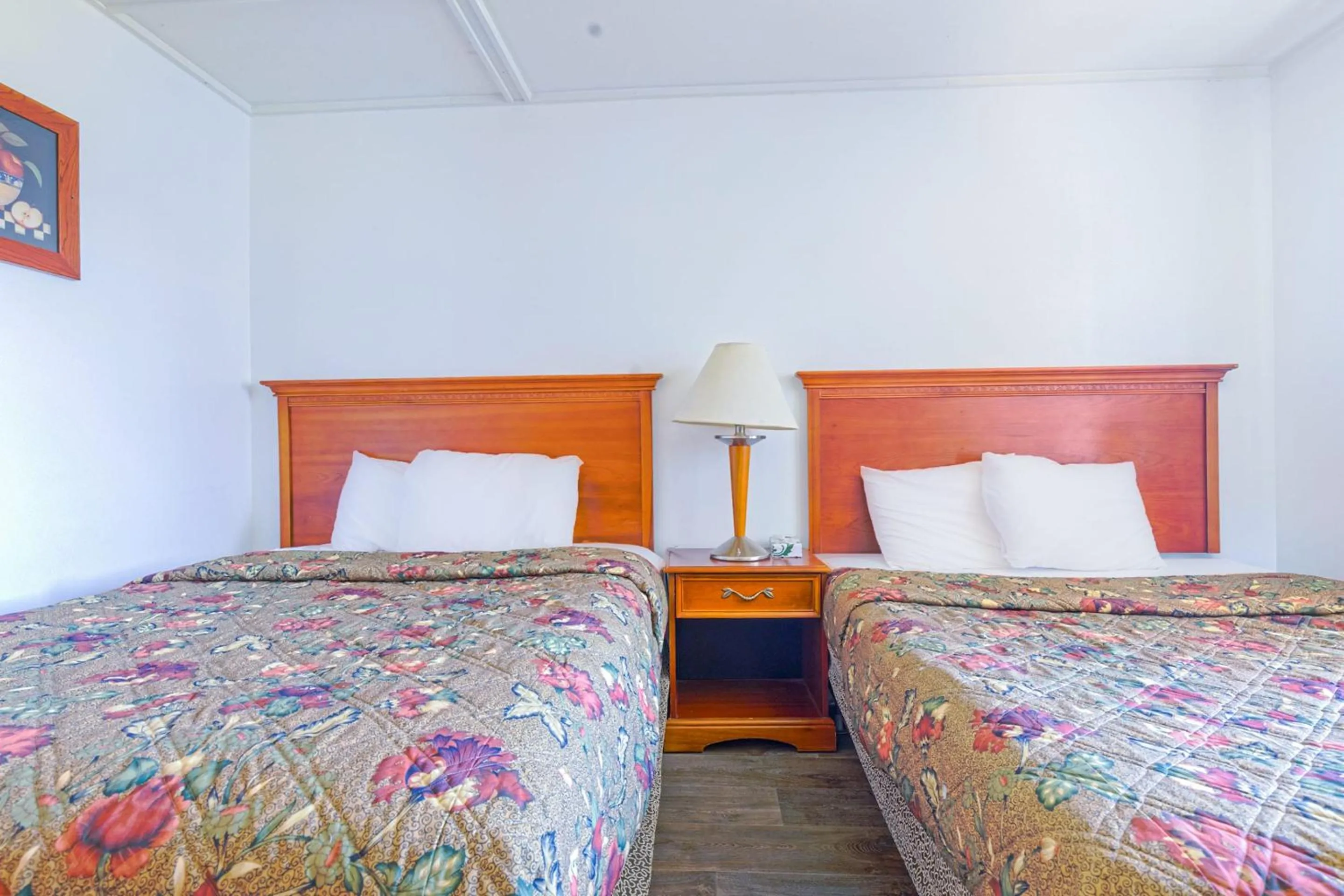 Bedroom, Bed in Country Hearth Inn & Suites By OYO Sturgis