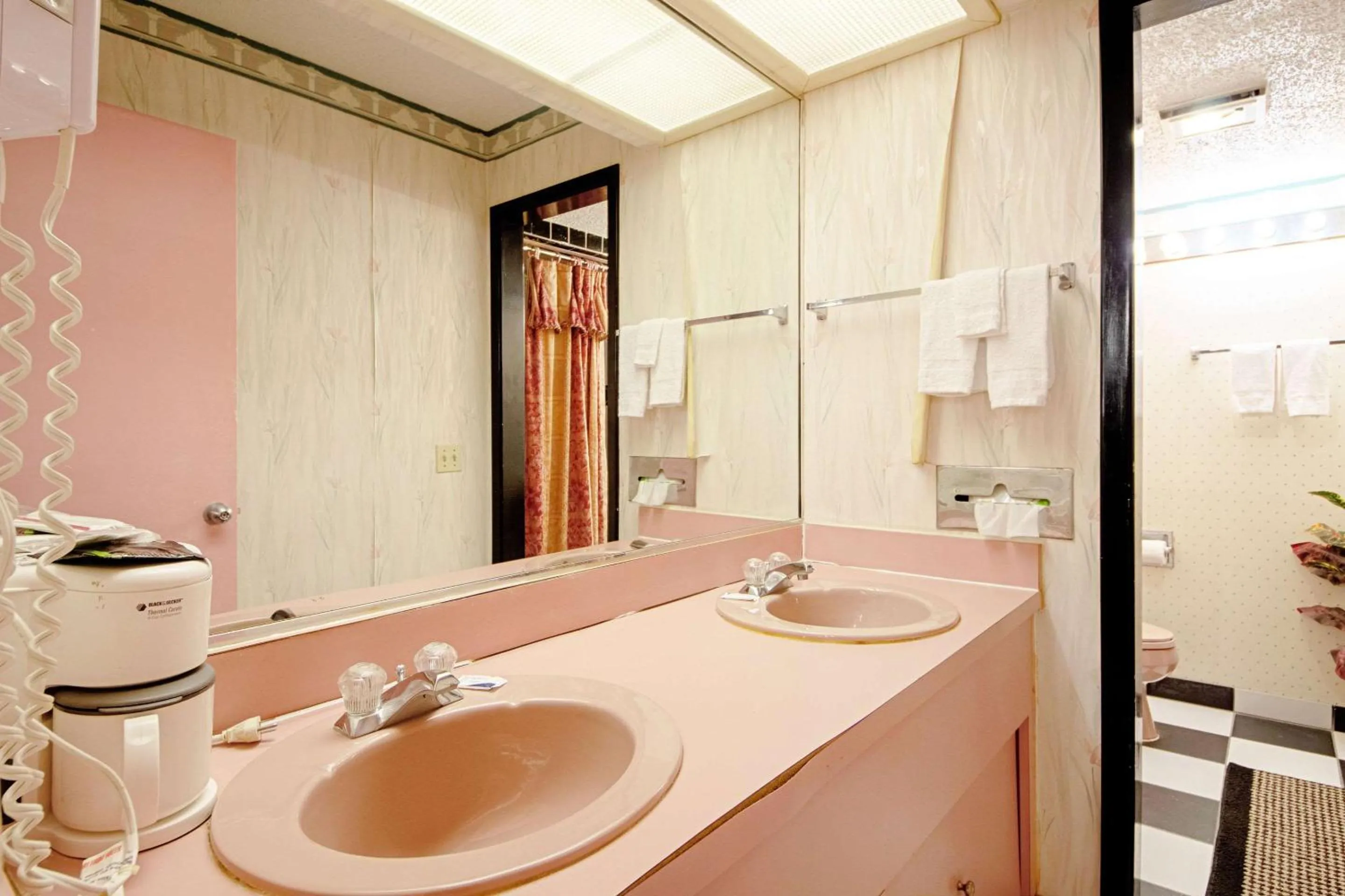 Bathroom in Economy Inn & Suites