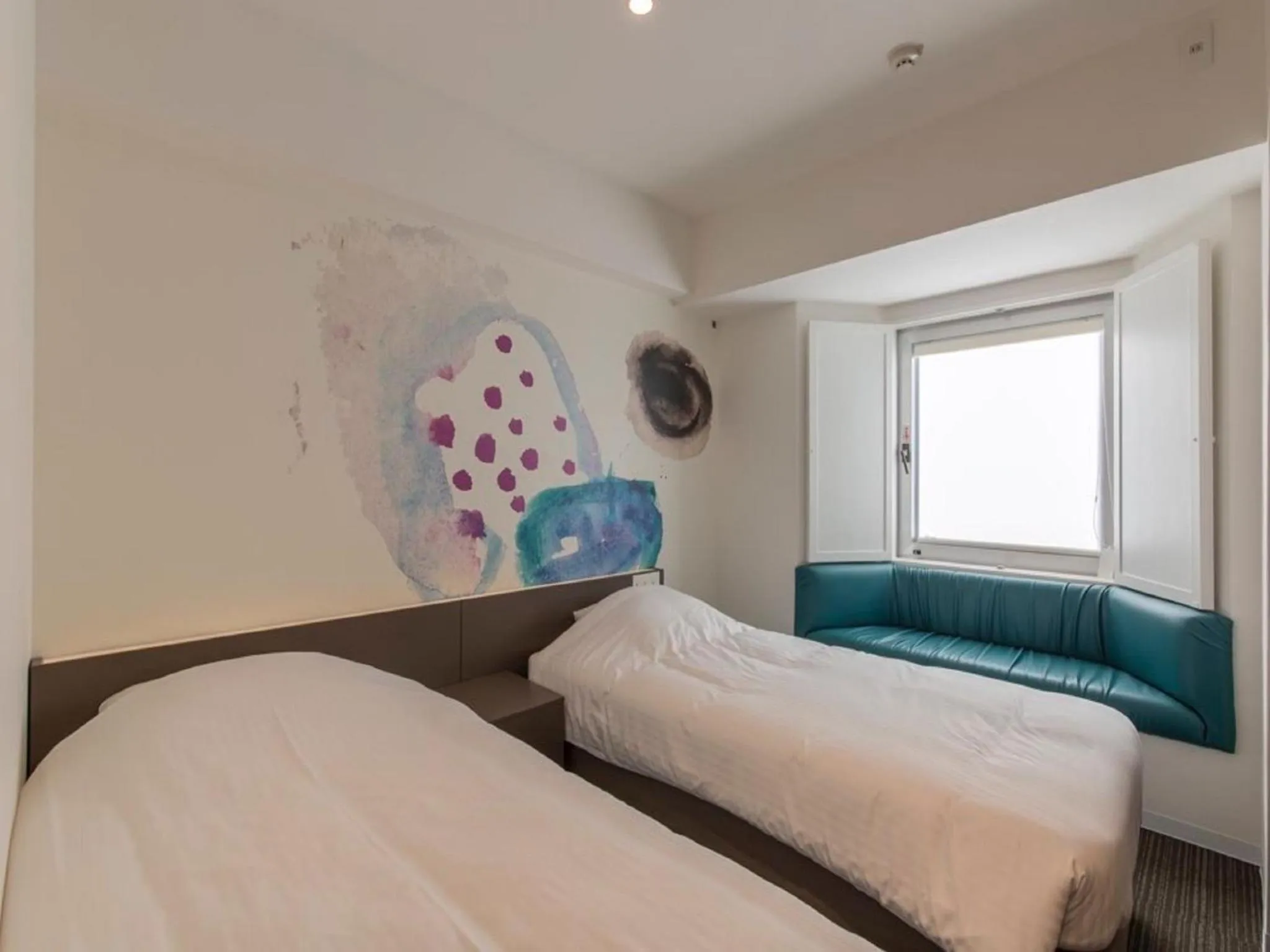 Photo of the whole room, Bed in Hotel Art Stay Naha Kokusai-Dori