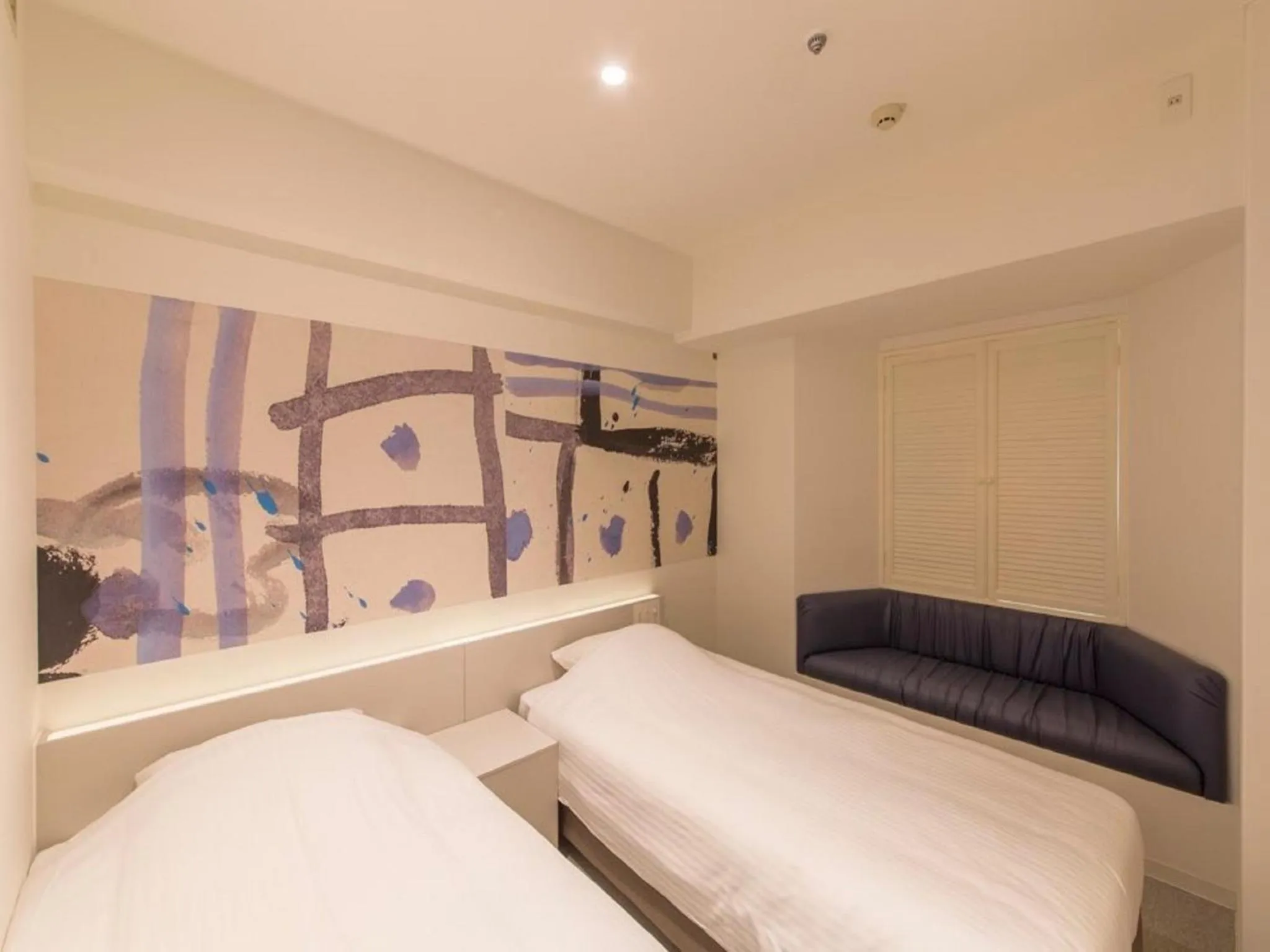 Photo of the whole room, Bed in Hotel Art Stay Naha Kokusai-Dori
