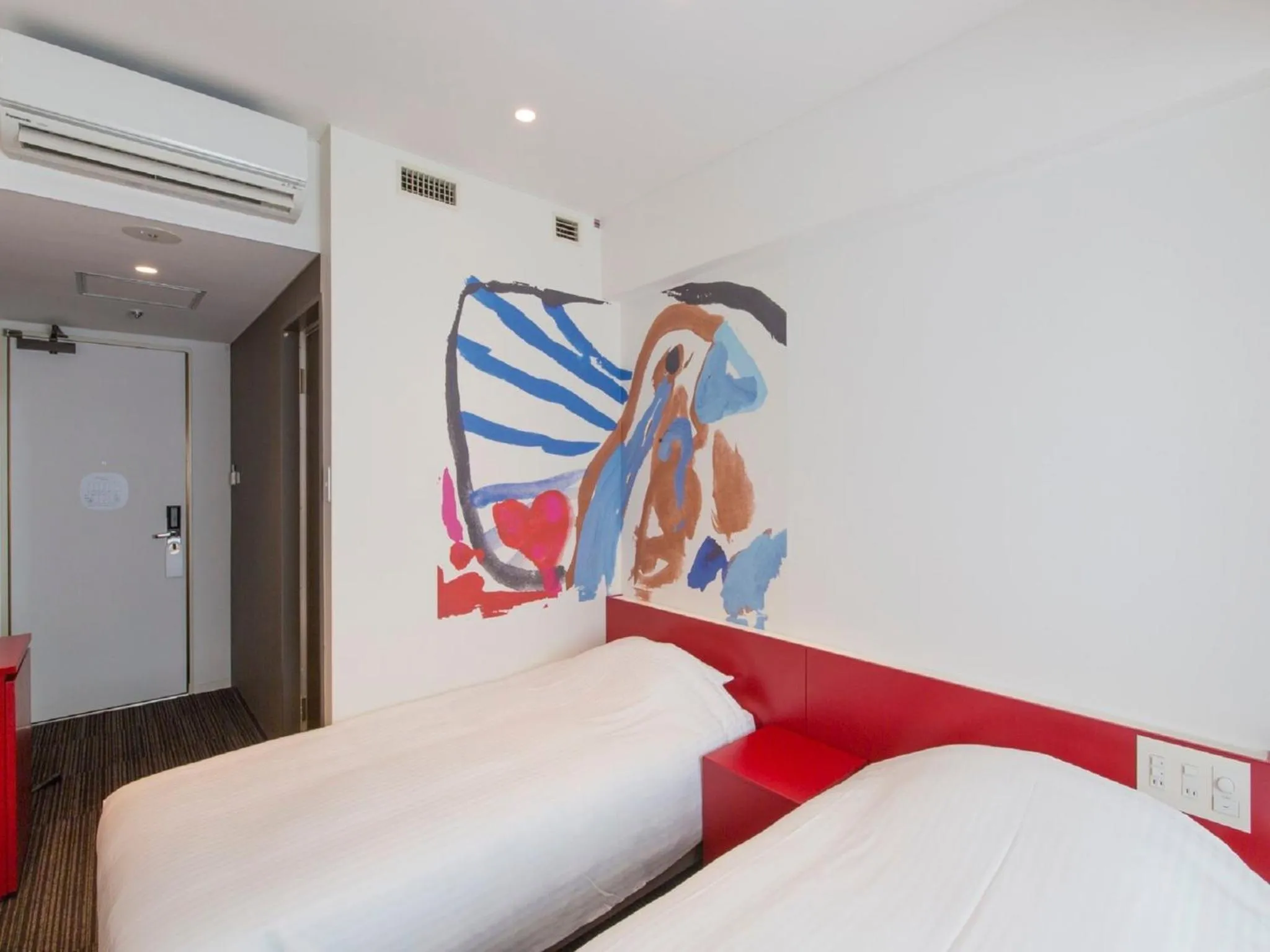 Photo of the whole room, Bed in Hotel Art Stay Naha Kokusai-Dori