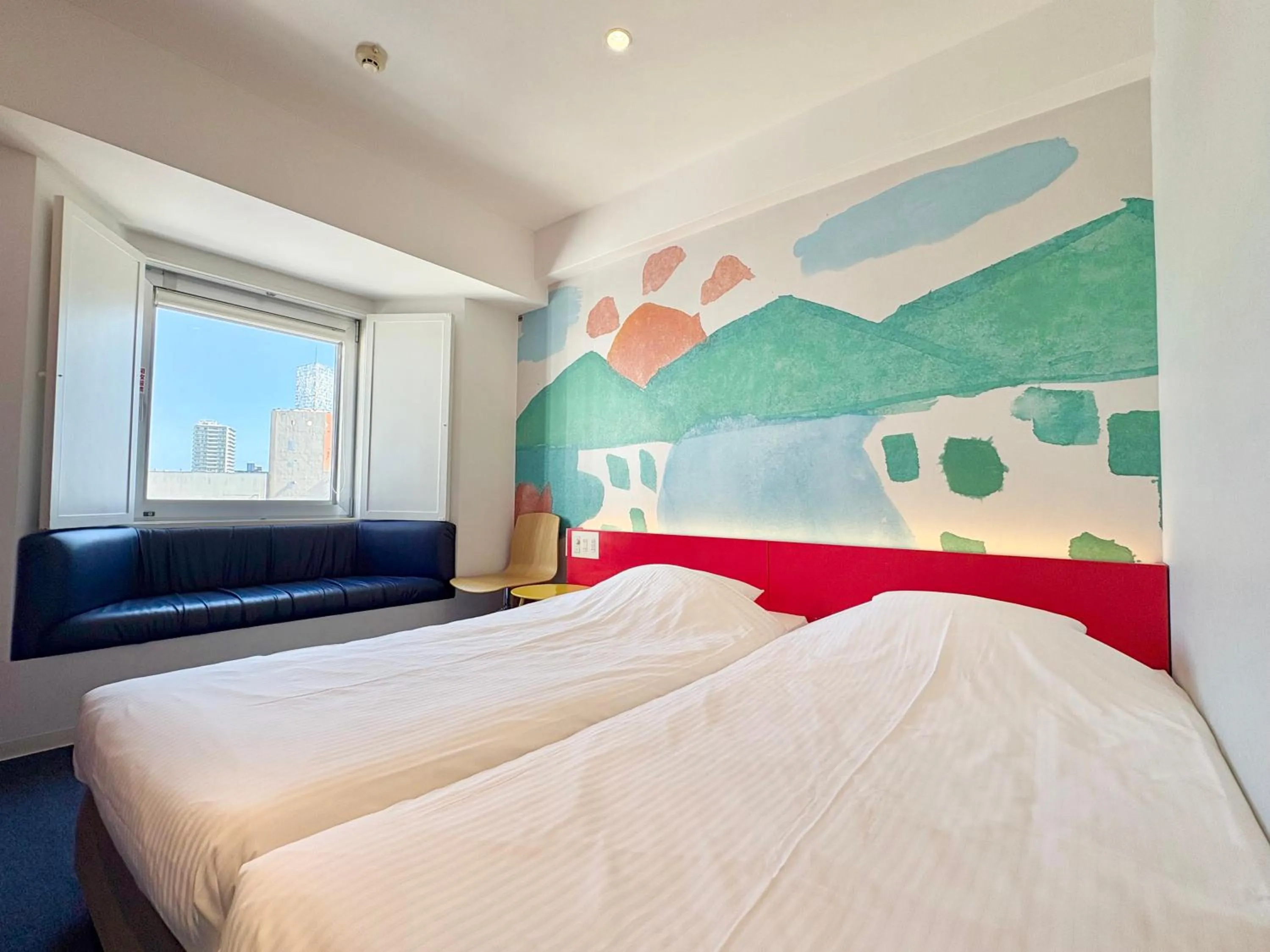 Photo of the whole room, Bed in Hotel Art Stay Naha Kokusai-Dori