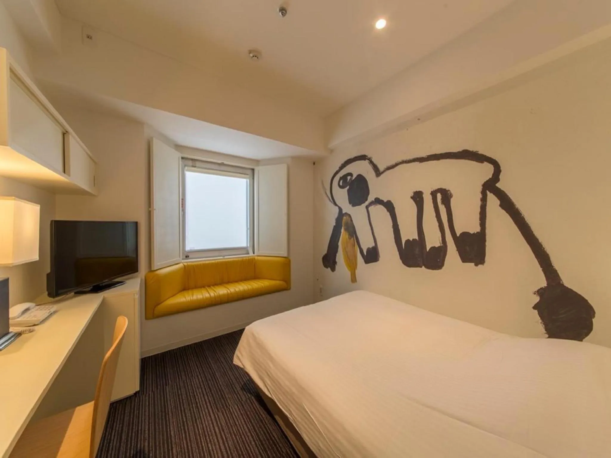 Photo of the whole room, Bed in Hotel Art Stay Naha Kokusai-Dori