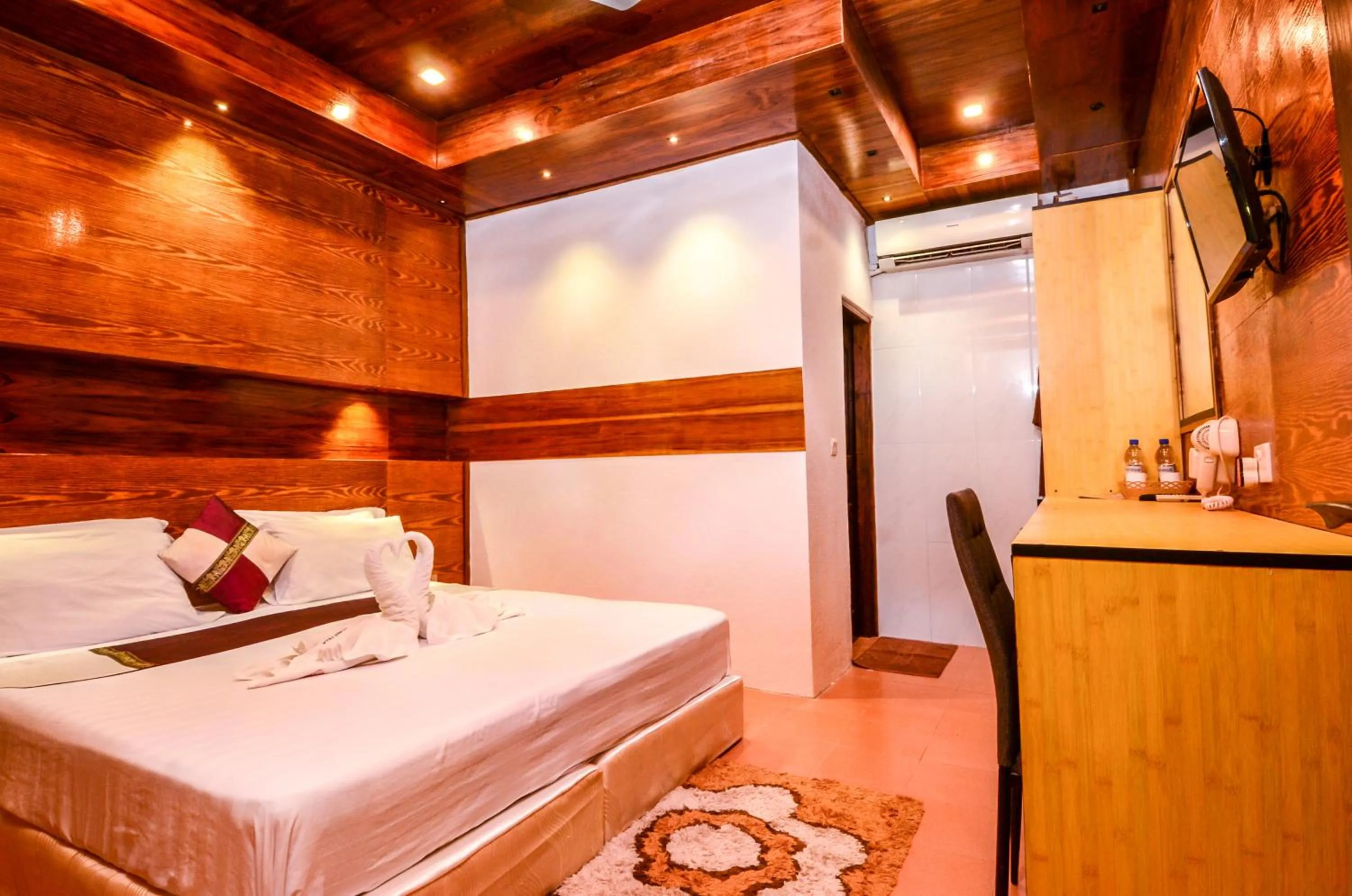 Bed in Summer Villa Guest House