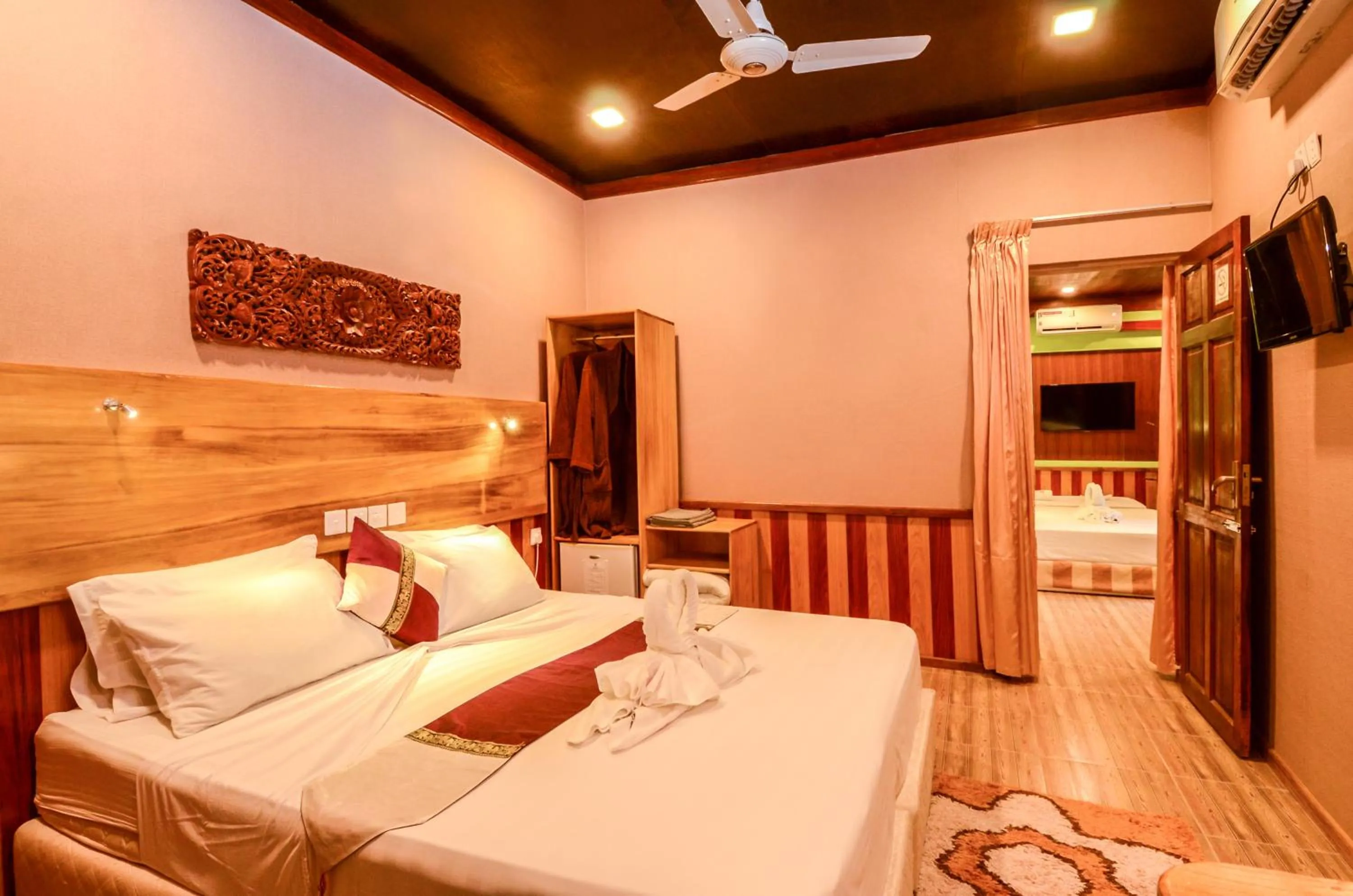 Bed in Summer Villa Guest House